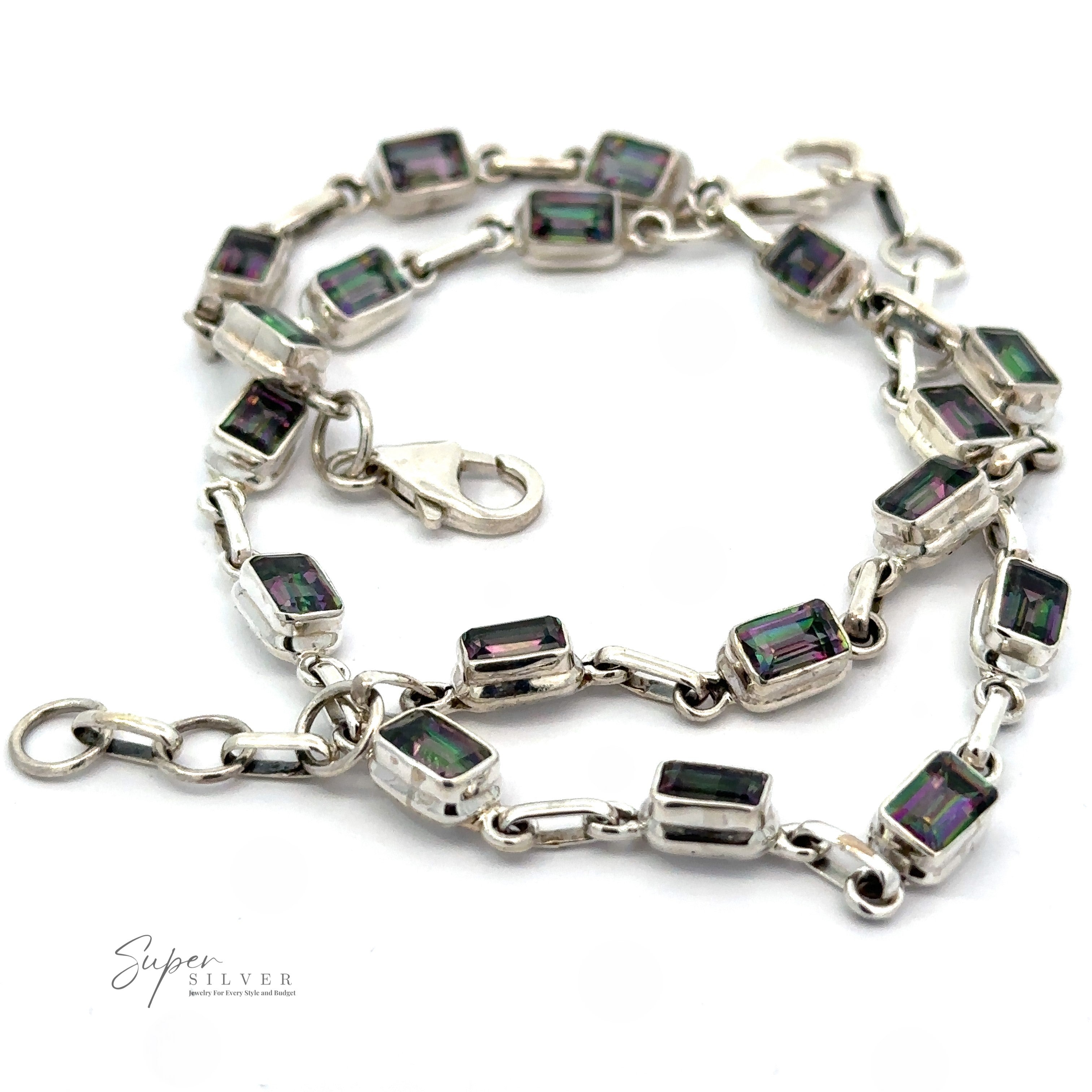 A Rainbow Mystic Topaz Rectangle Link Bracelet featuring rectangular prismatic mystic topaz gemstones set in silver links, with a lobster claw clasp.