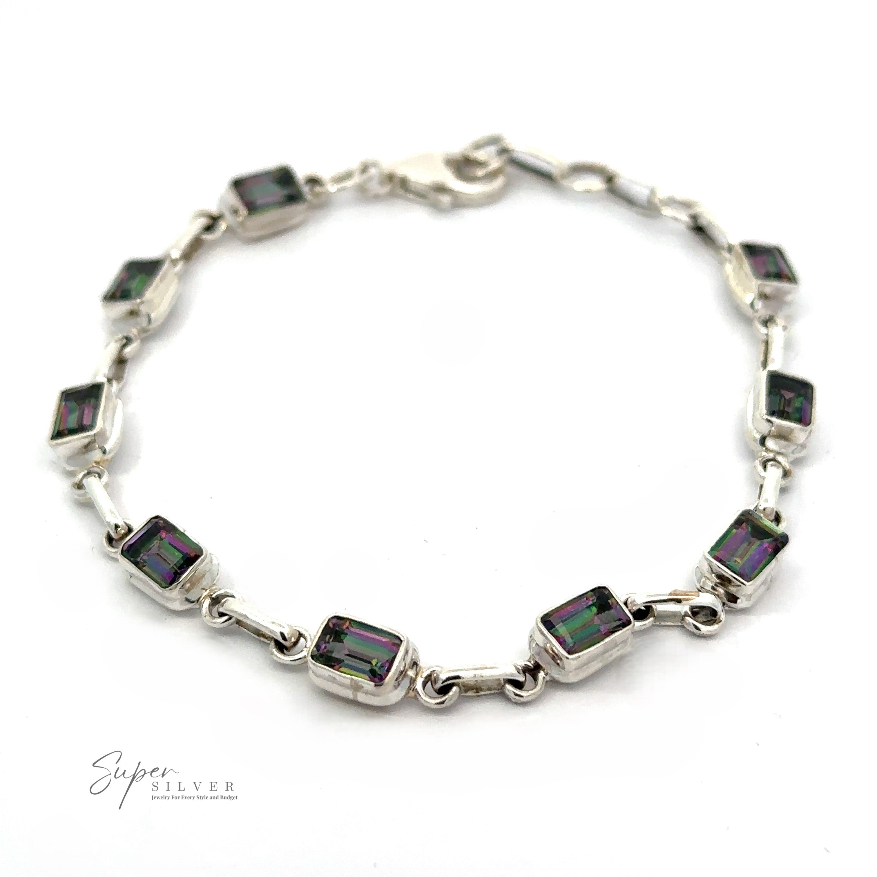 A sterling silver bracelet featuring rectangular, iridescent multicolor stones linked together, with a lobster clasp closure. The Rainbow Mystic Topaz Rectangle Link Bracelet is displayed on a plain white background.