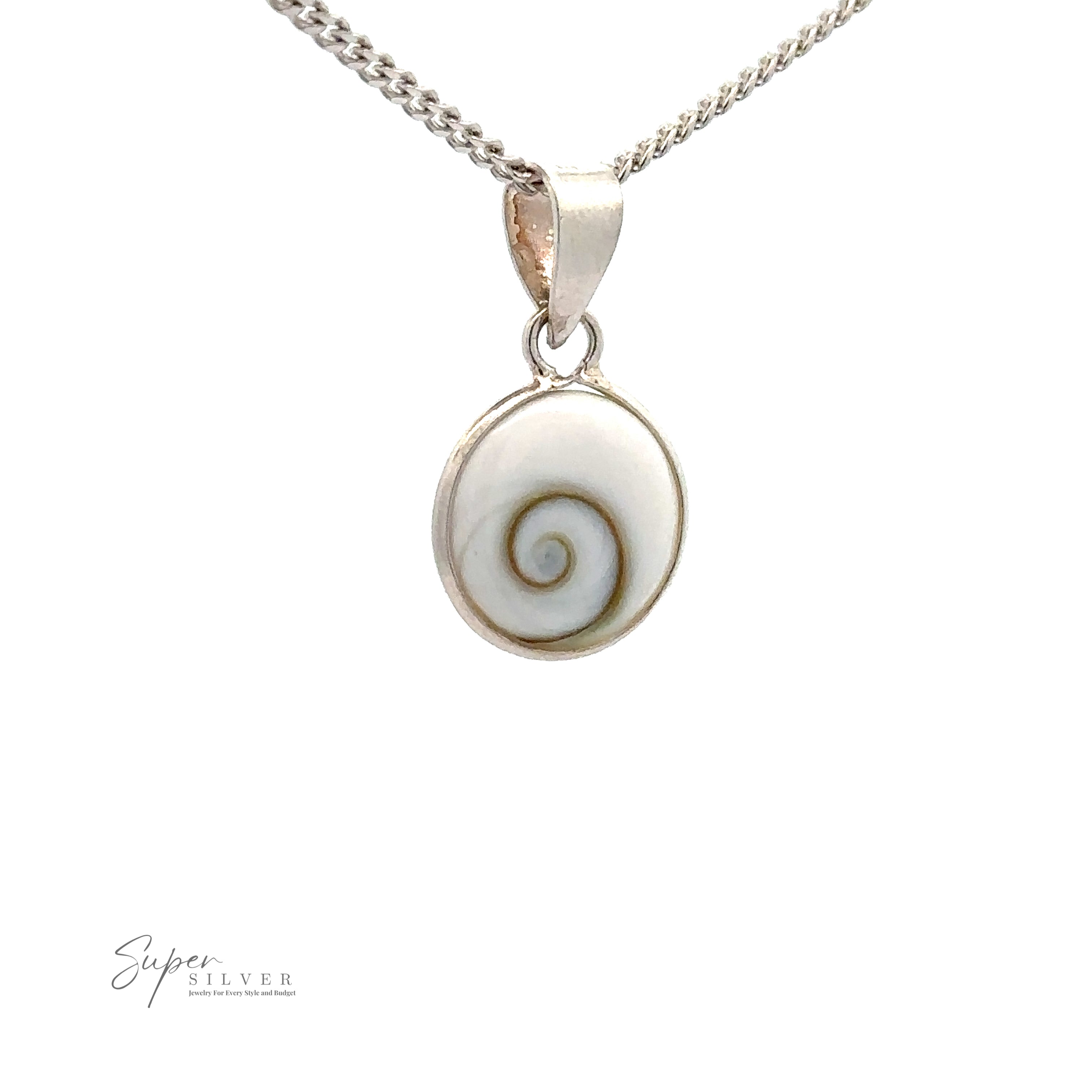 A silver chain necklace showcases a Small Round Shiva Shell Pendant featuring a circular white stone with a spiral pattern, adding coastal elegance to any outfit. The piece is crafted from .925 Sterling Silver for lasting beauty and quality.