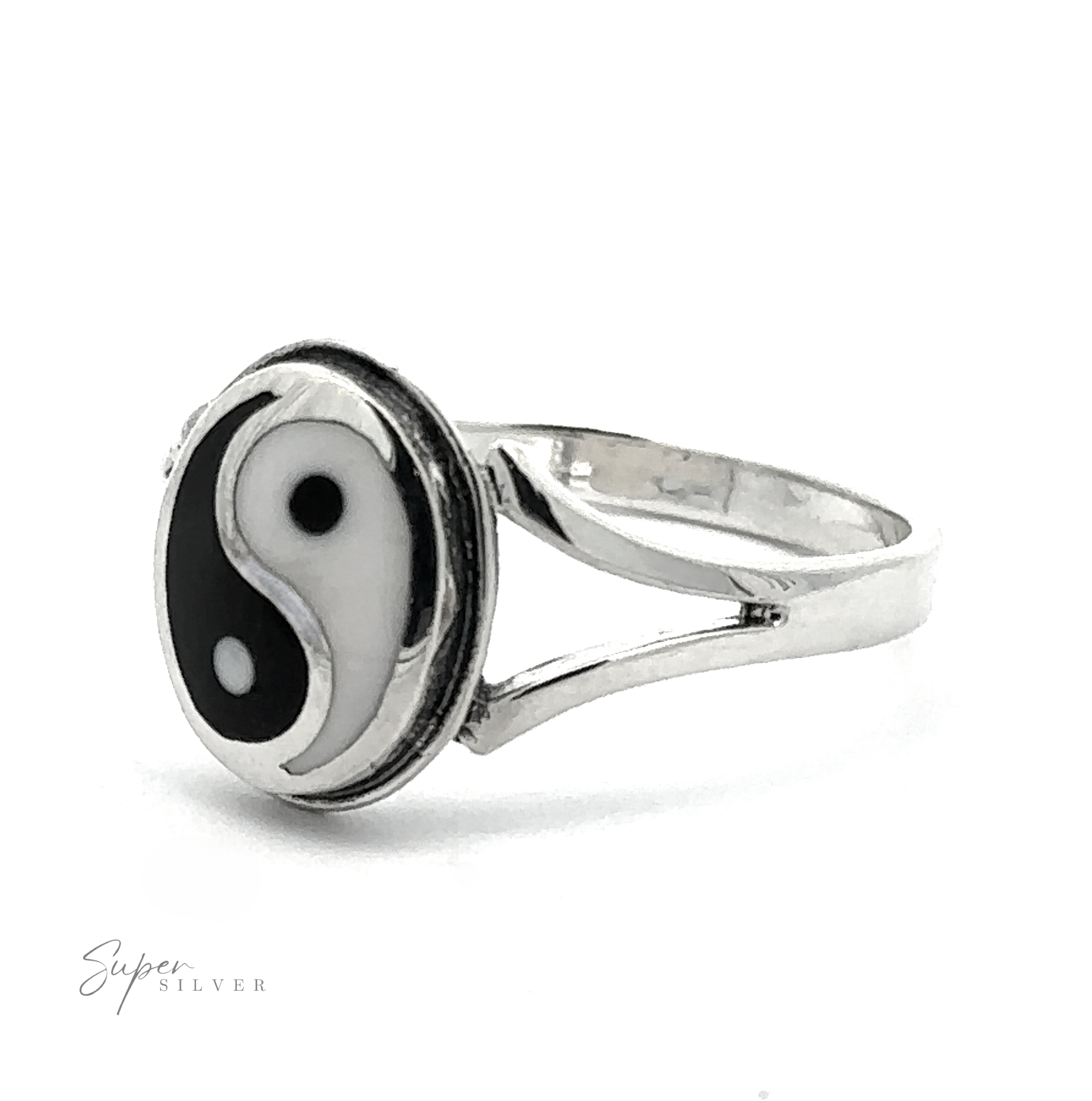 The Simple Inlaid Yin-Yang Ring is a sterling silver piece with a minimalist design, featuring a narrow band and an oval-shaped face adorned with a black and white yin-yang symbol, making it perfect for those who appreciate understated elegance.