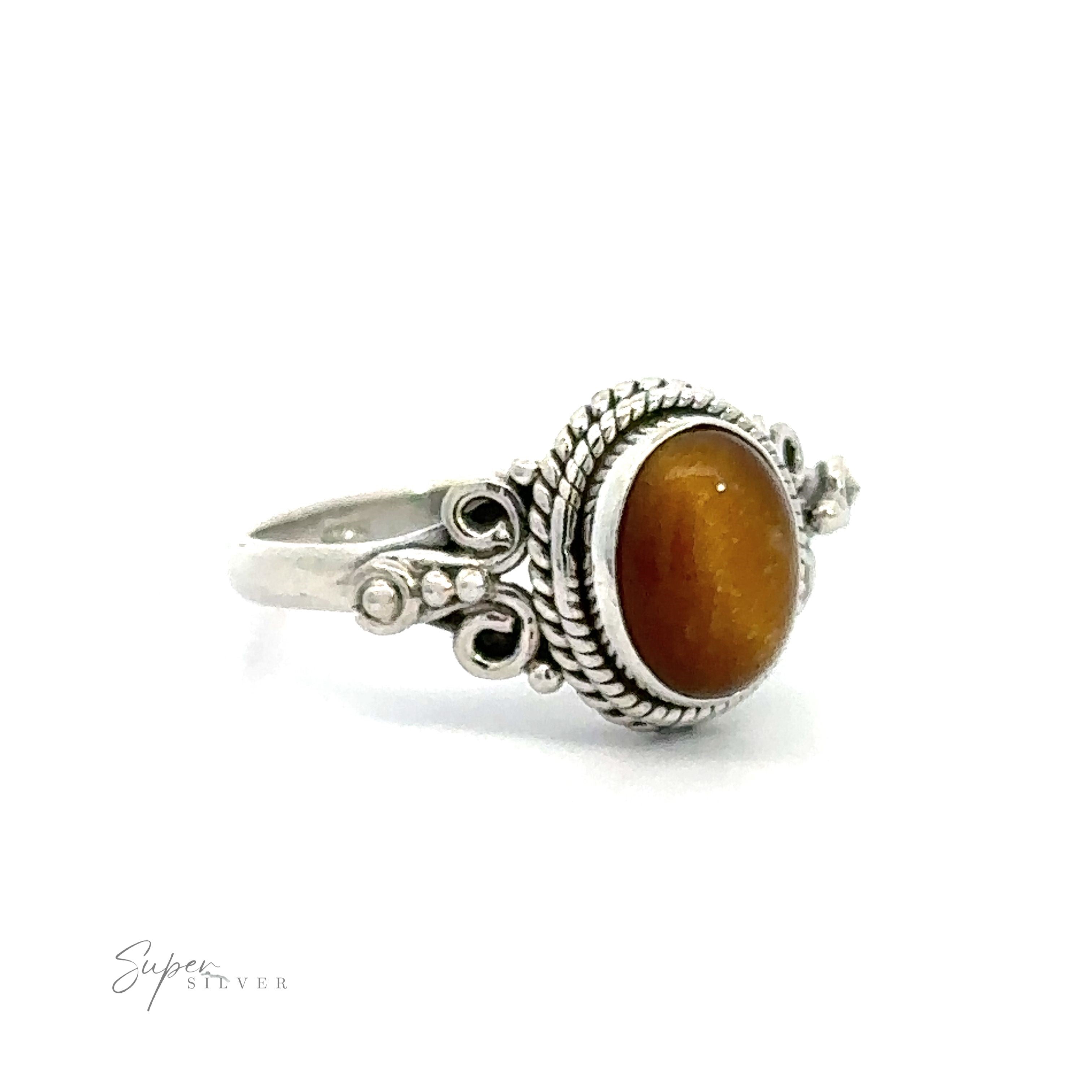 Amber gemstone set in a Natural Oval Gemstone Ring with Intricate Rope and Long Spiral Border vintage boho ring.
