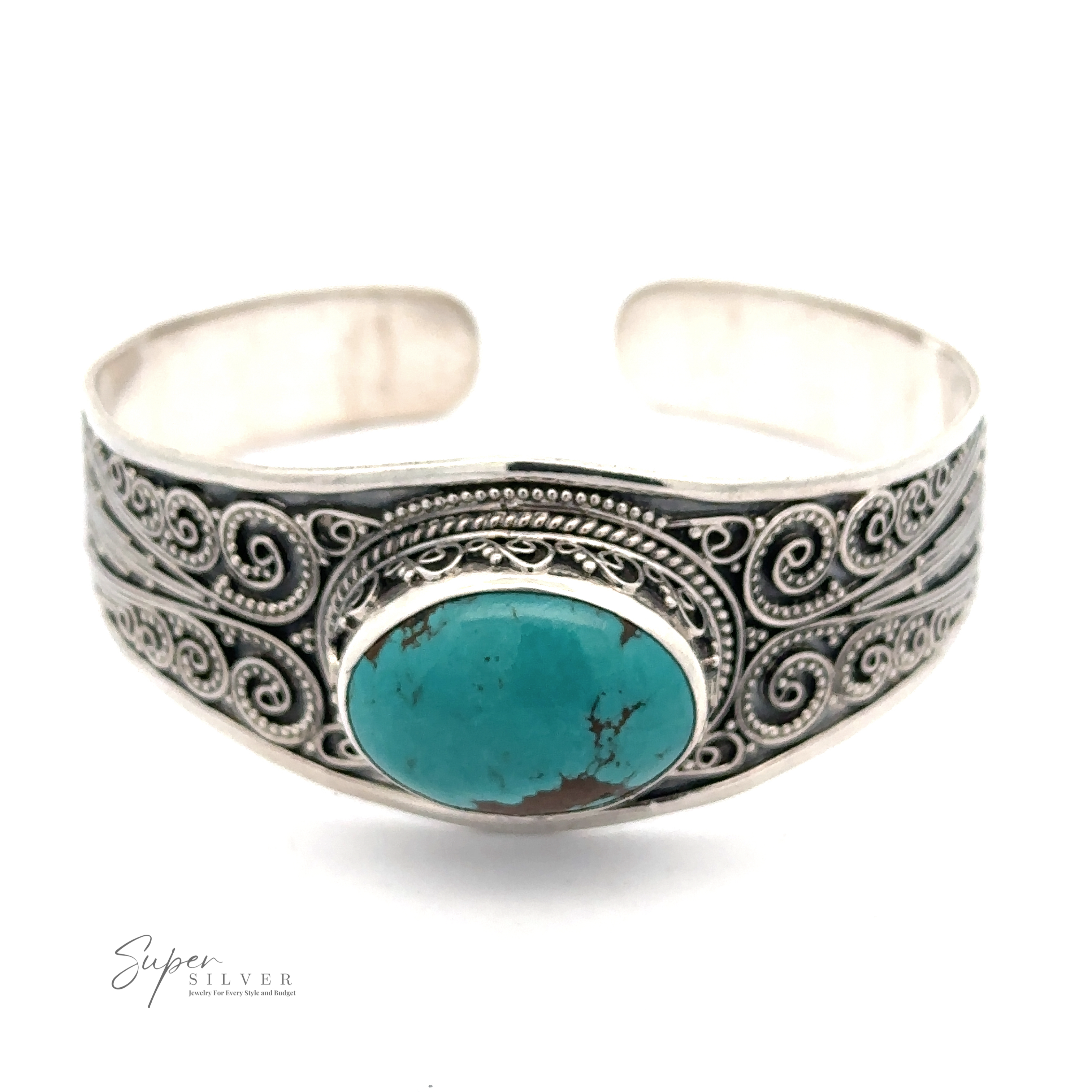 A Genuine Turquoise Bali Cuff Bracelet with intricate scrolling designs and a large, genuine turquoise stone in the center. The logo "Super Silver" is visible in the lower left corner, highlighting its .925 Sterling Silver craftsmanship.