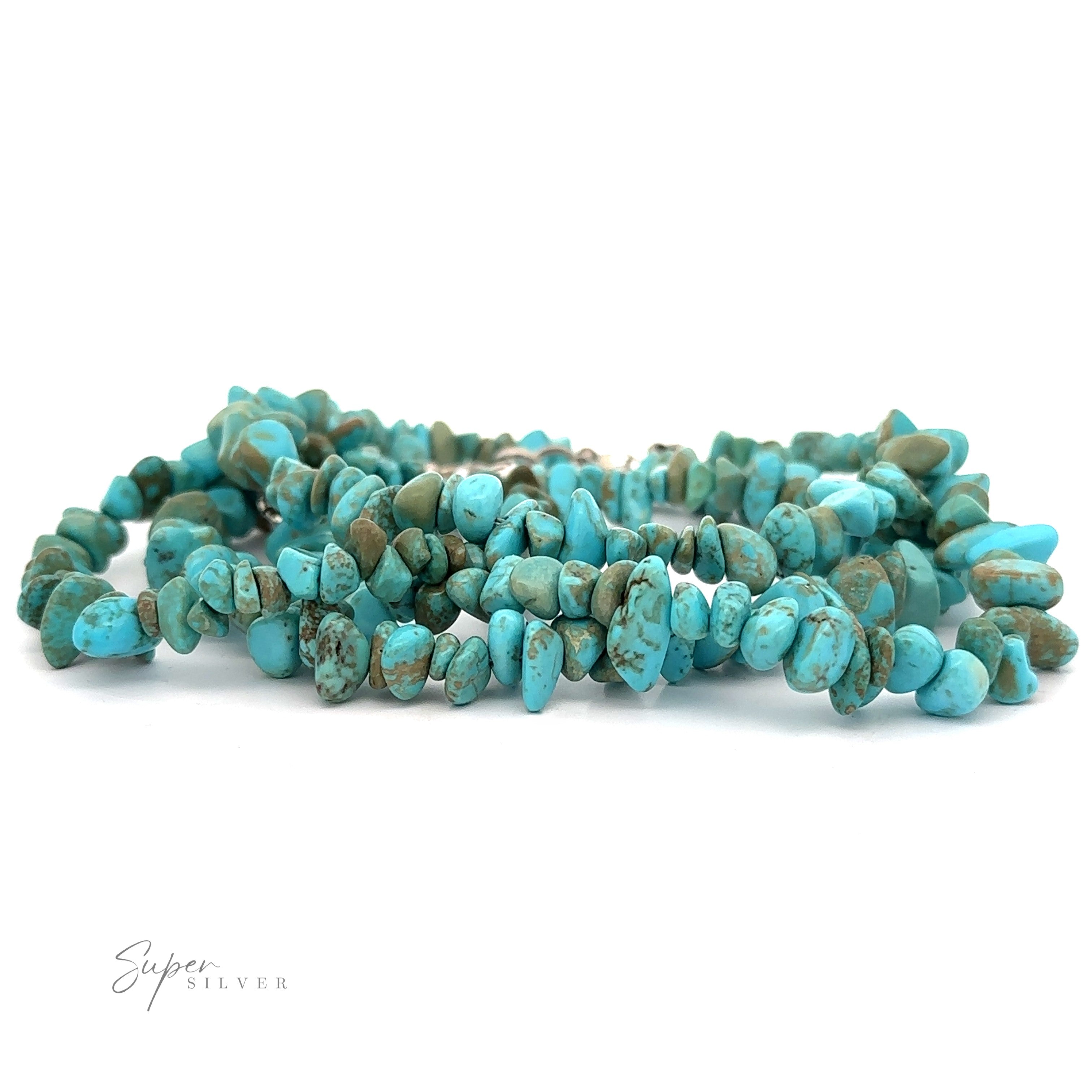 A Southwest Colorado Turquoise Chip Bracelet or Anklet made of multiple strands of irregularly shaped turquoise beads, radiating southwest charm, is displayed against a white background. The logo "Super Silver" is seen in the bottom left corner.