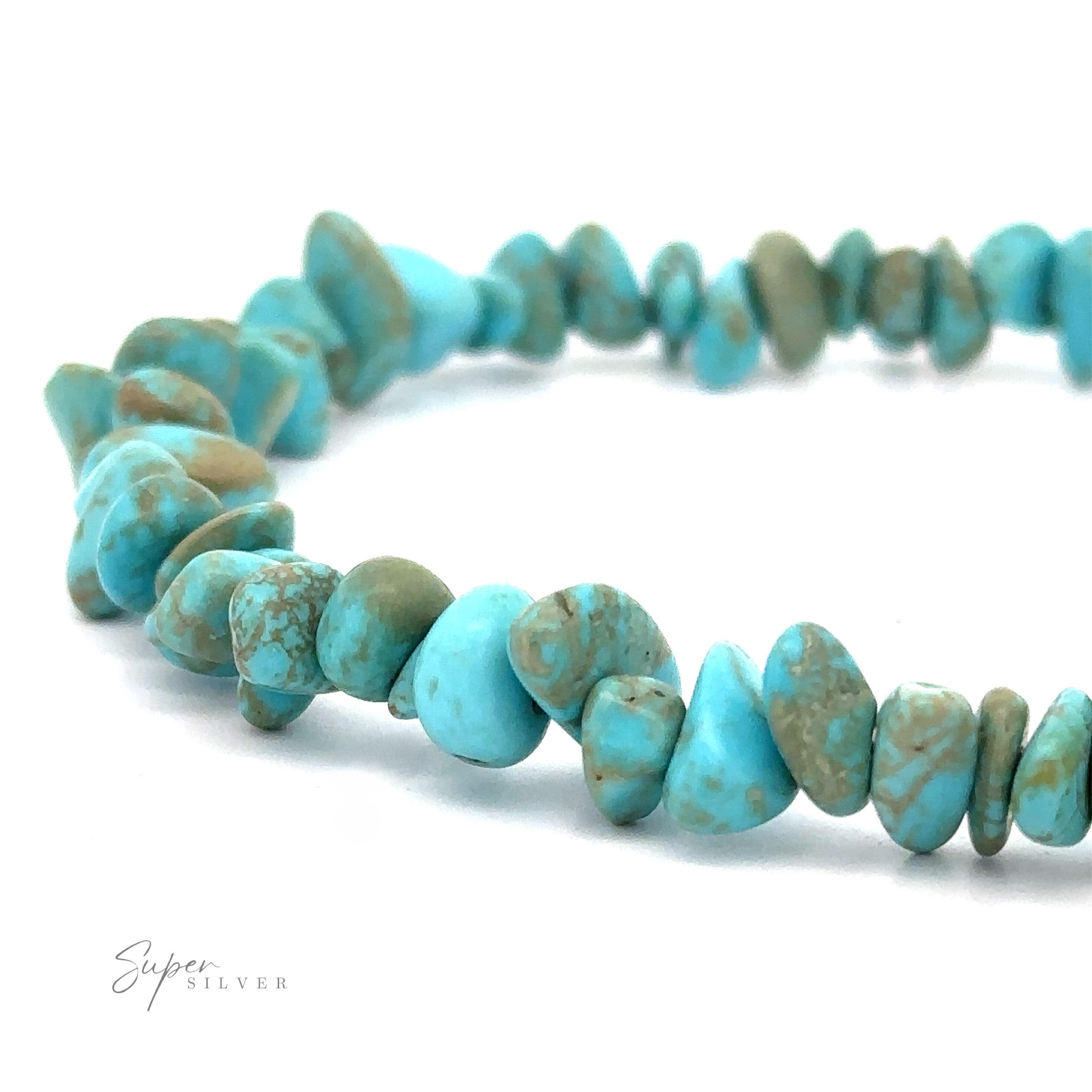 Close-up of a Southwest Colorado Turquoise Chip Bracelet or Anklet with irregularly shaped stones on a white background, showcasing its southwest charm.