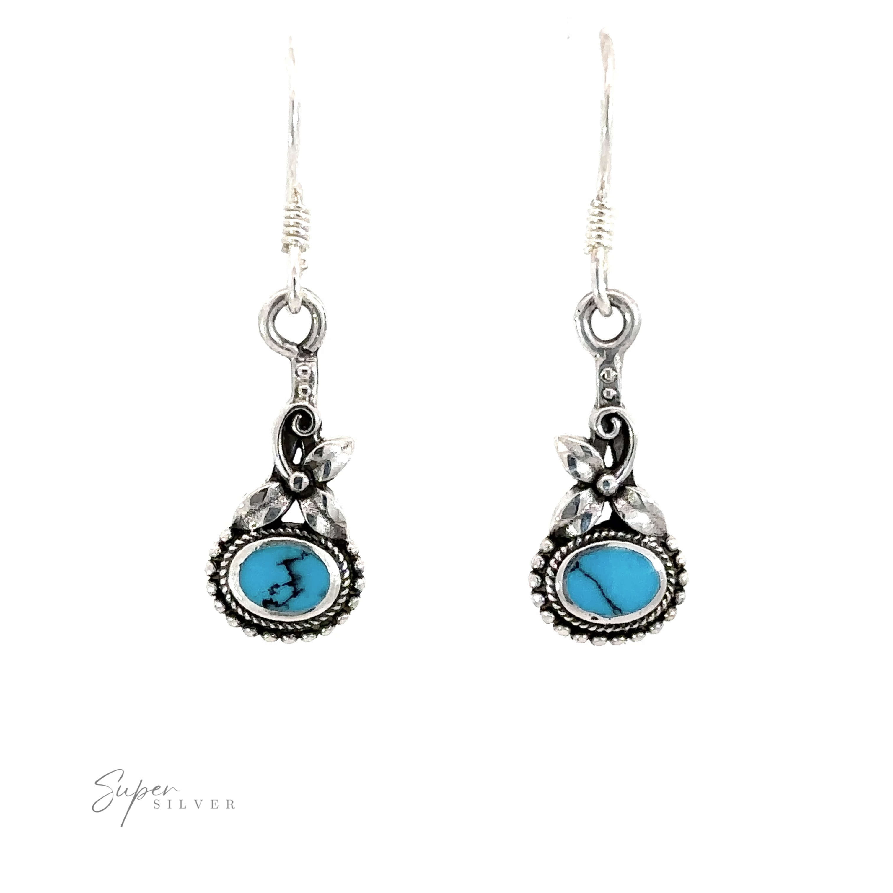 A pair of Inlaid Flower Earrings with Oval Stone, giving off a Vintage Charm vibe.