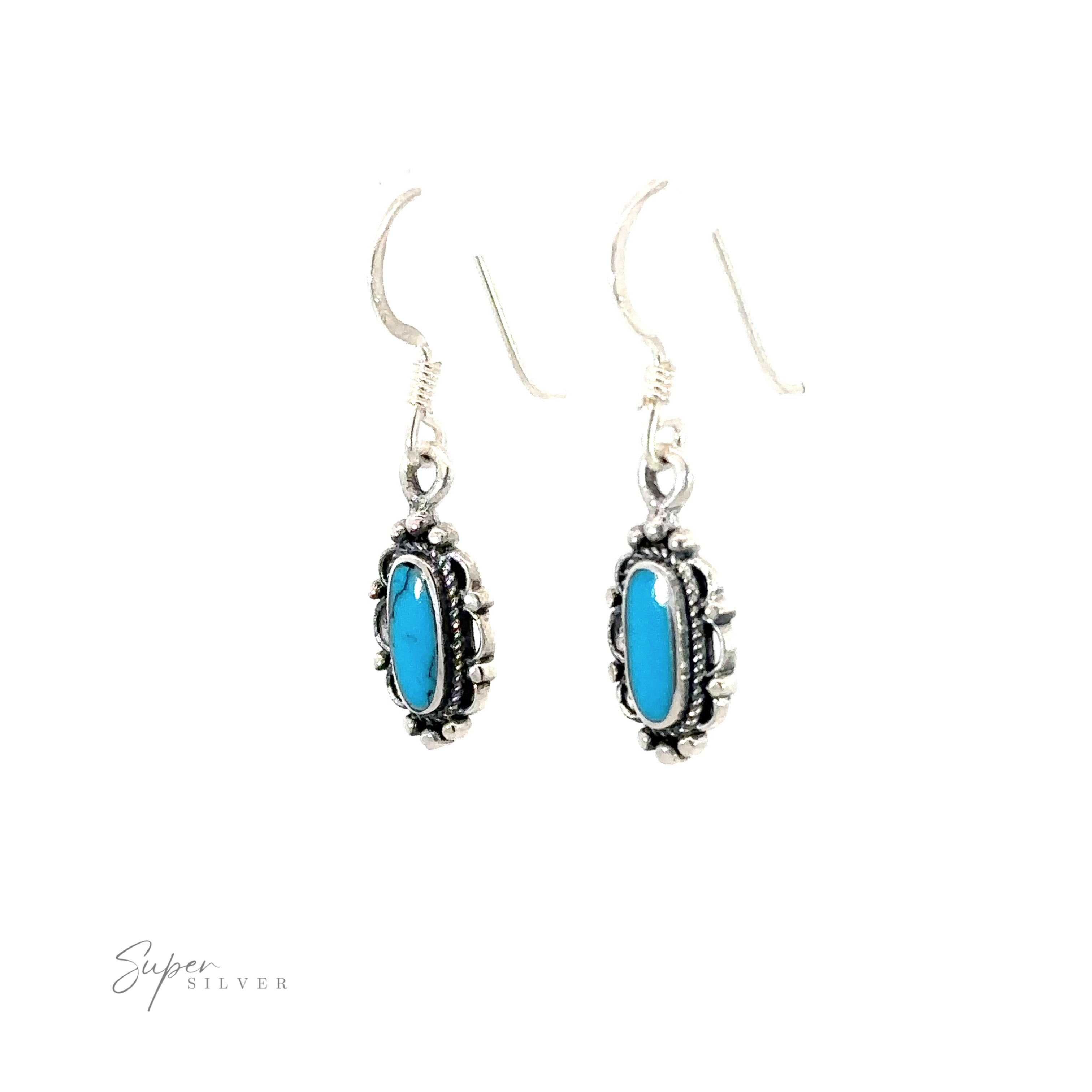 A pair of Dainty Vintage Inspired Oval Inlaid Stone Earrings with blue stones.