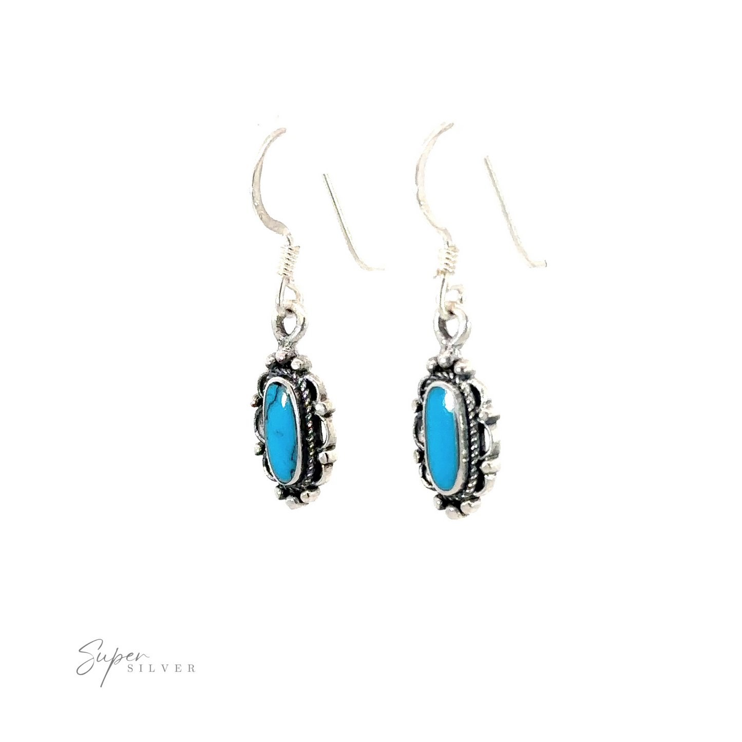 
                  
                    A pair of Dainty Vintage Inspired Oval Inlaid Stone Earrings with blue stones.
                  
                