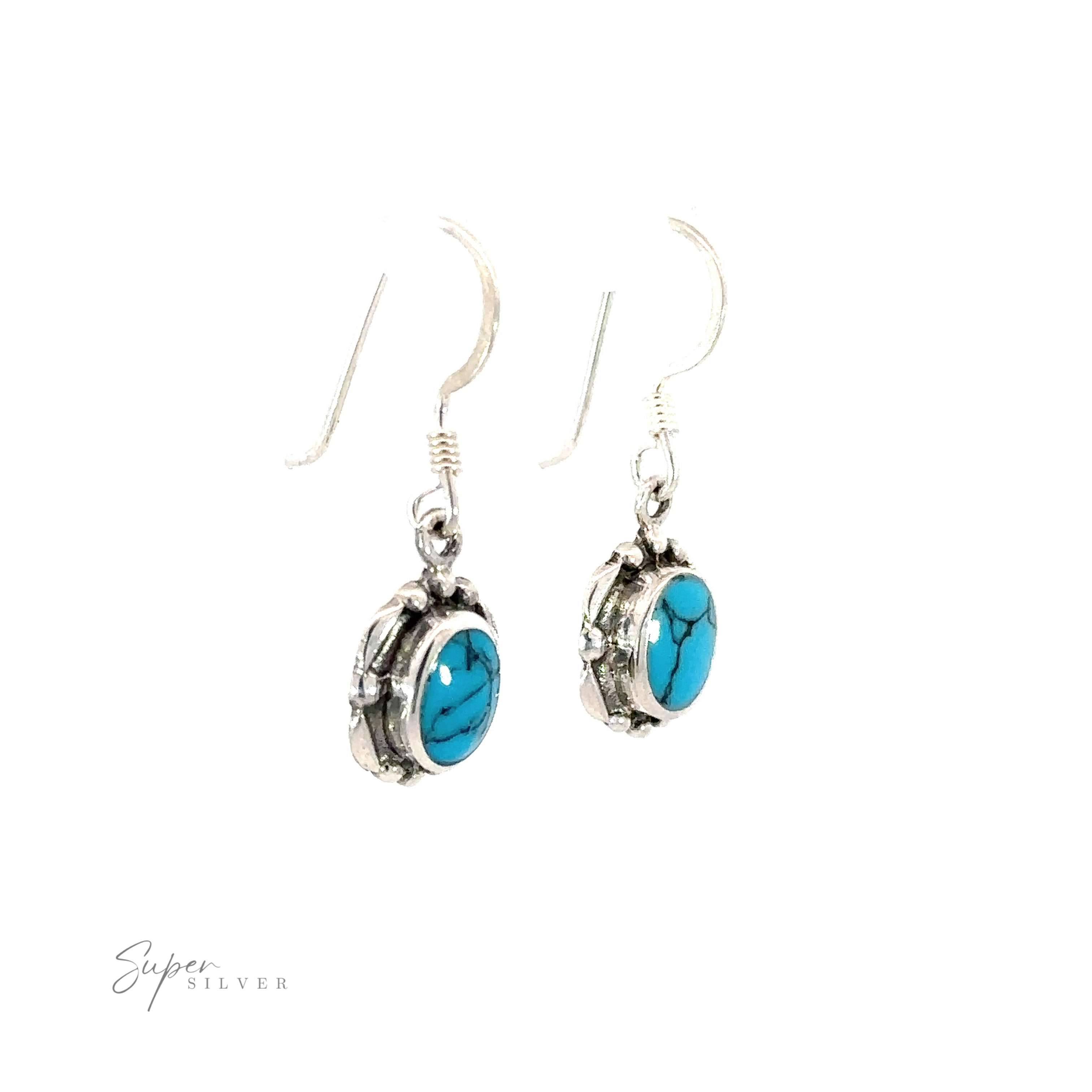 A pair of Oval Inlaid Stone Earrings with inlaid turquoise stones.