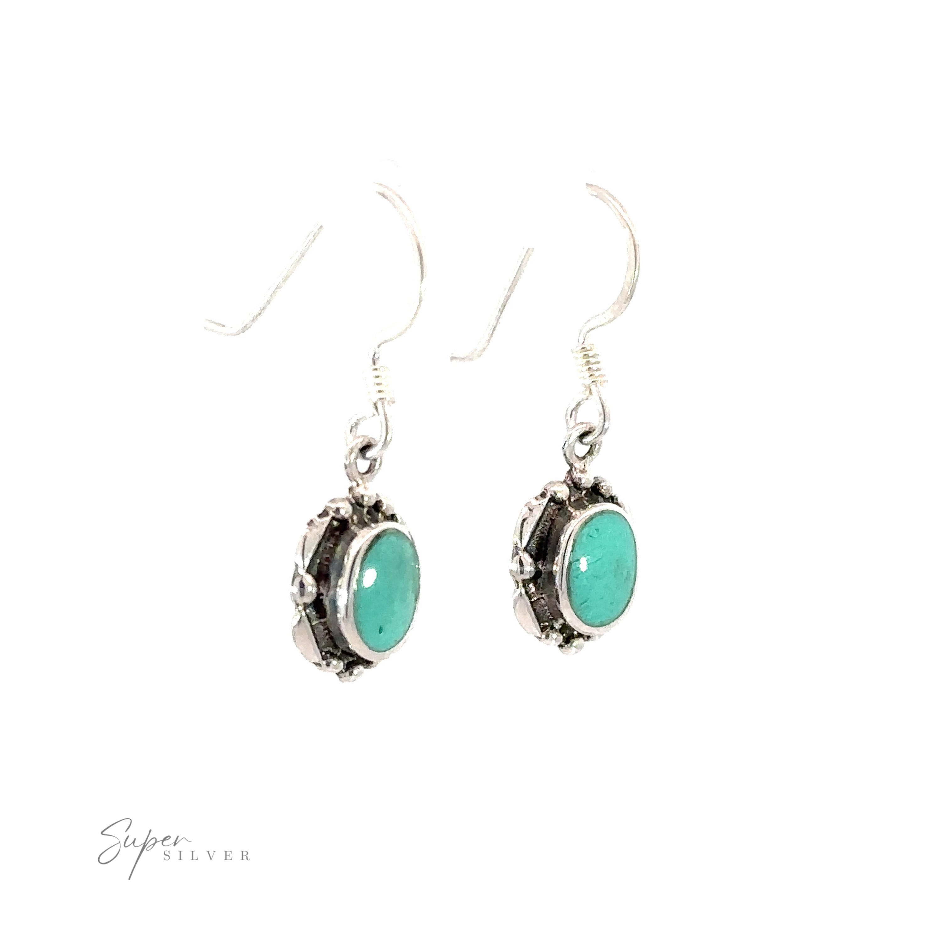 A pair of Oval Inlaid Stone Earrings made of sterling silver with inlaid turquoise stones.