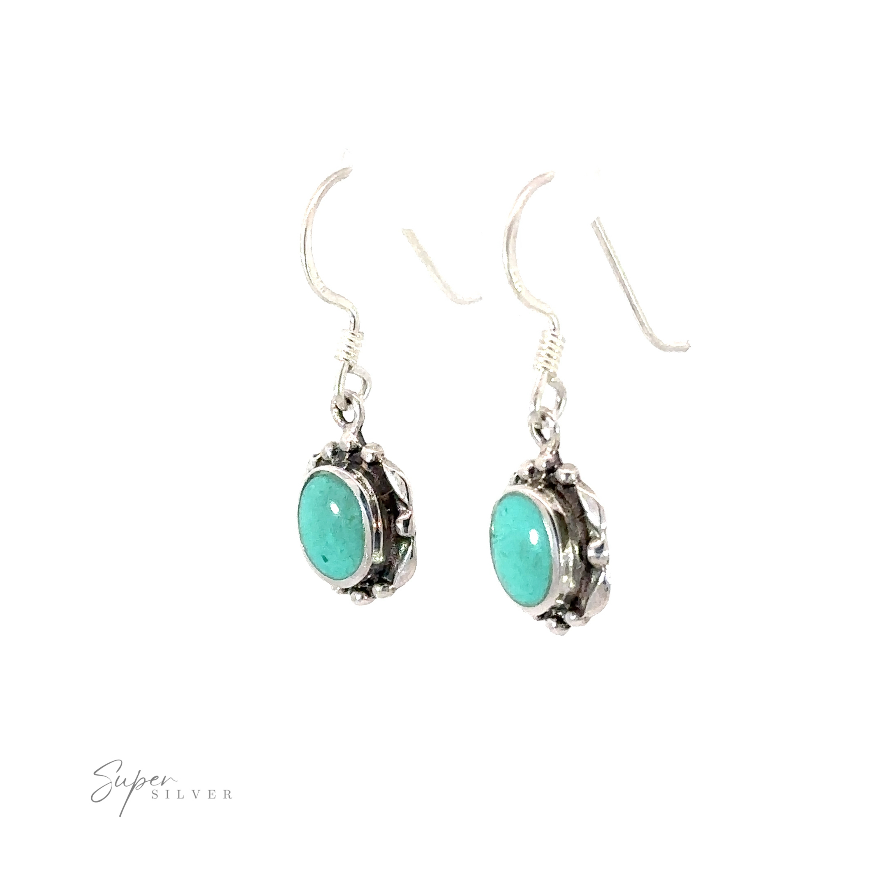 A pair of Oval Inlaid Stone Earrings, featuring sterling silver inlay, photographed on a white background.