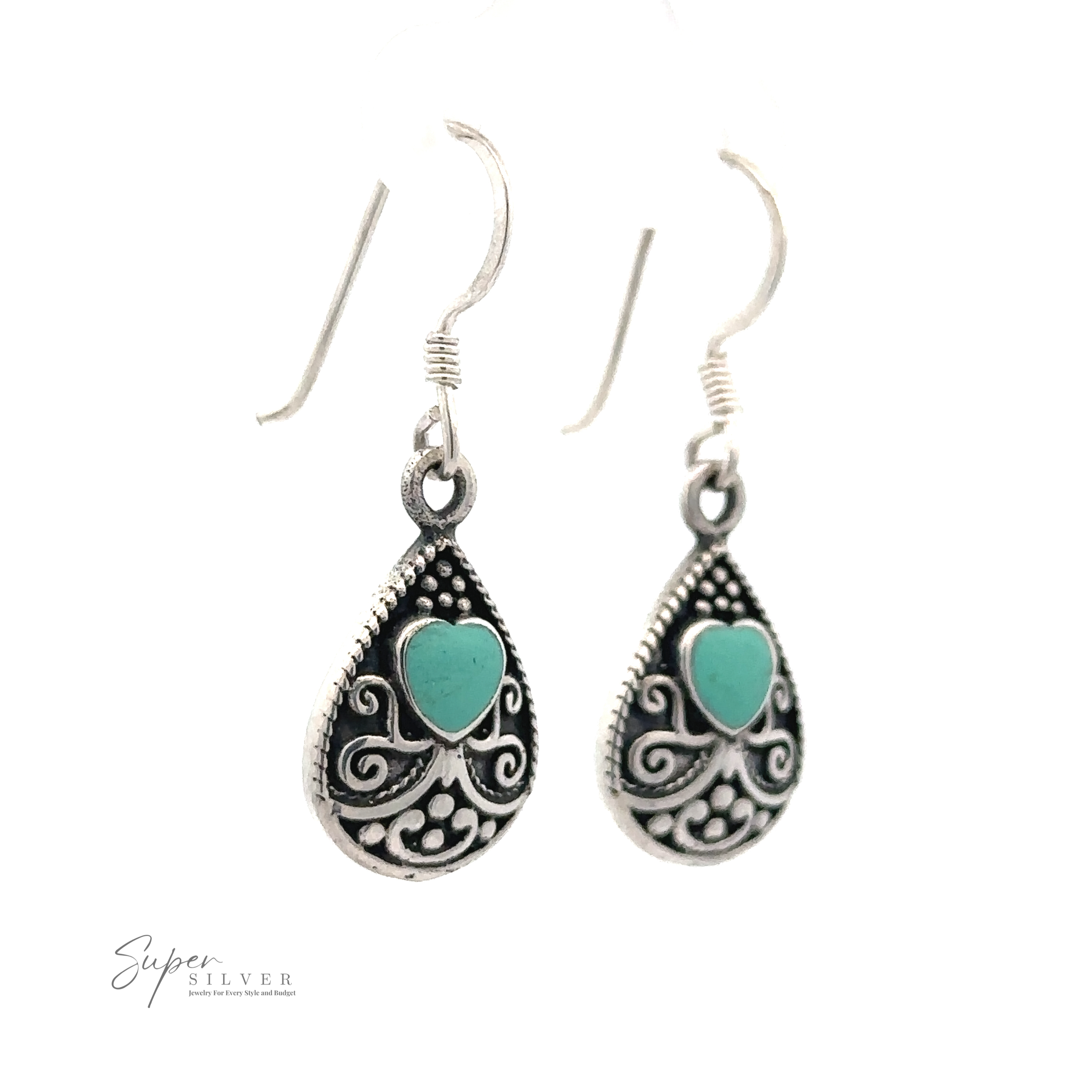 Pair of sterling silver hook earrings with intricate detailing and heart-shaped turquoise stones, reminiscent of Bali Style Teardrop Earrings with Inlaid Stone.