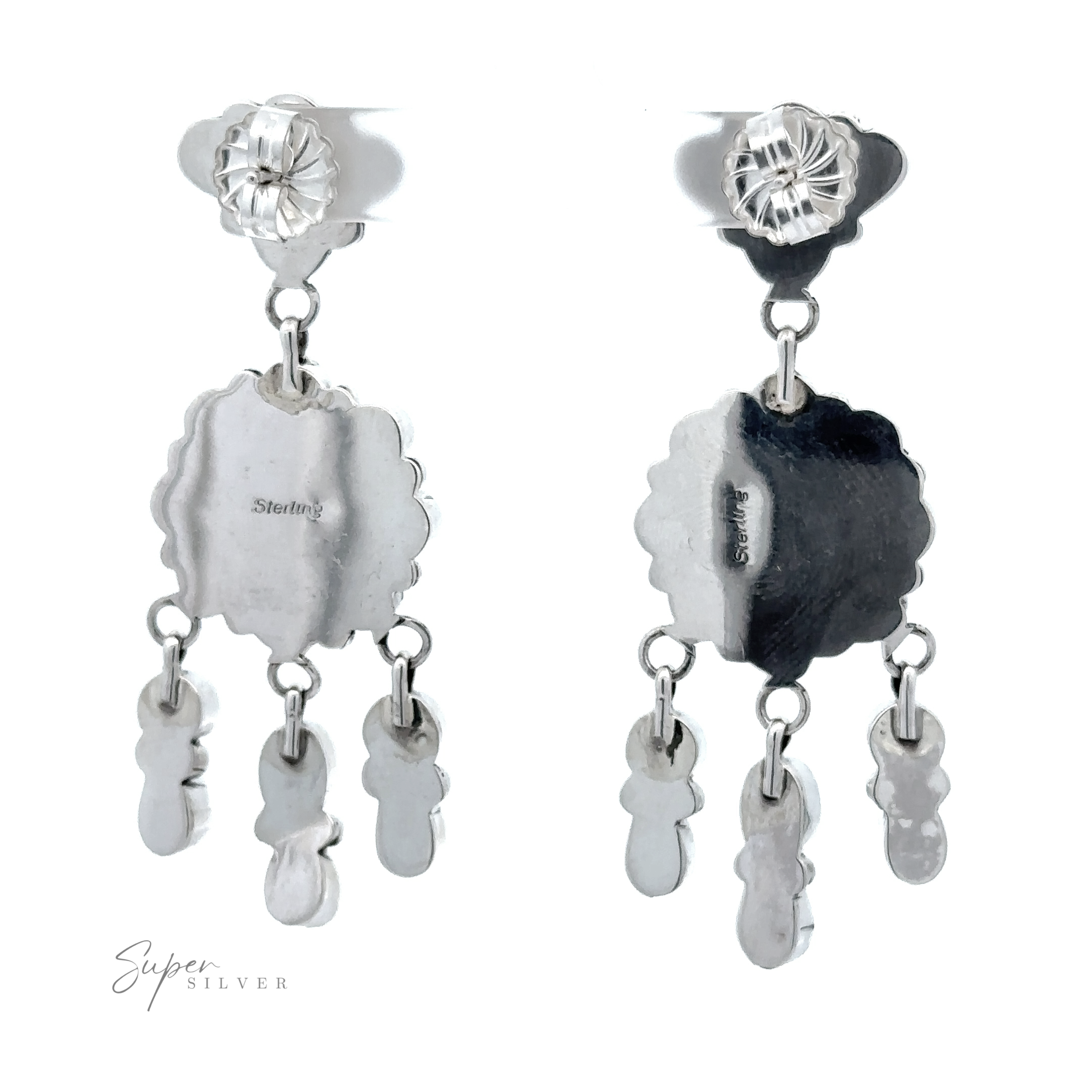 Pair of sterling silver dangle earrings with cutout heart designs and hanging Native American Turquoise Flower charms on a white background.