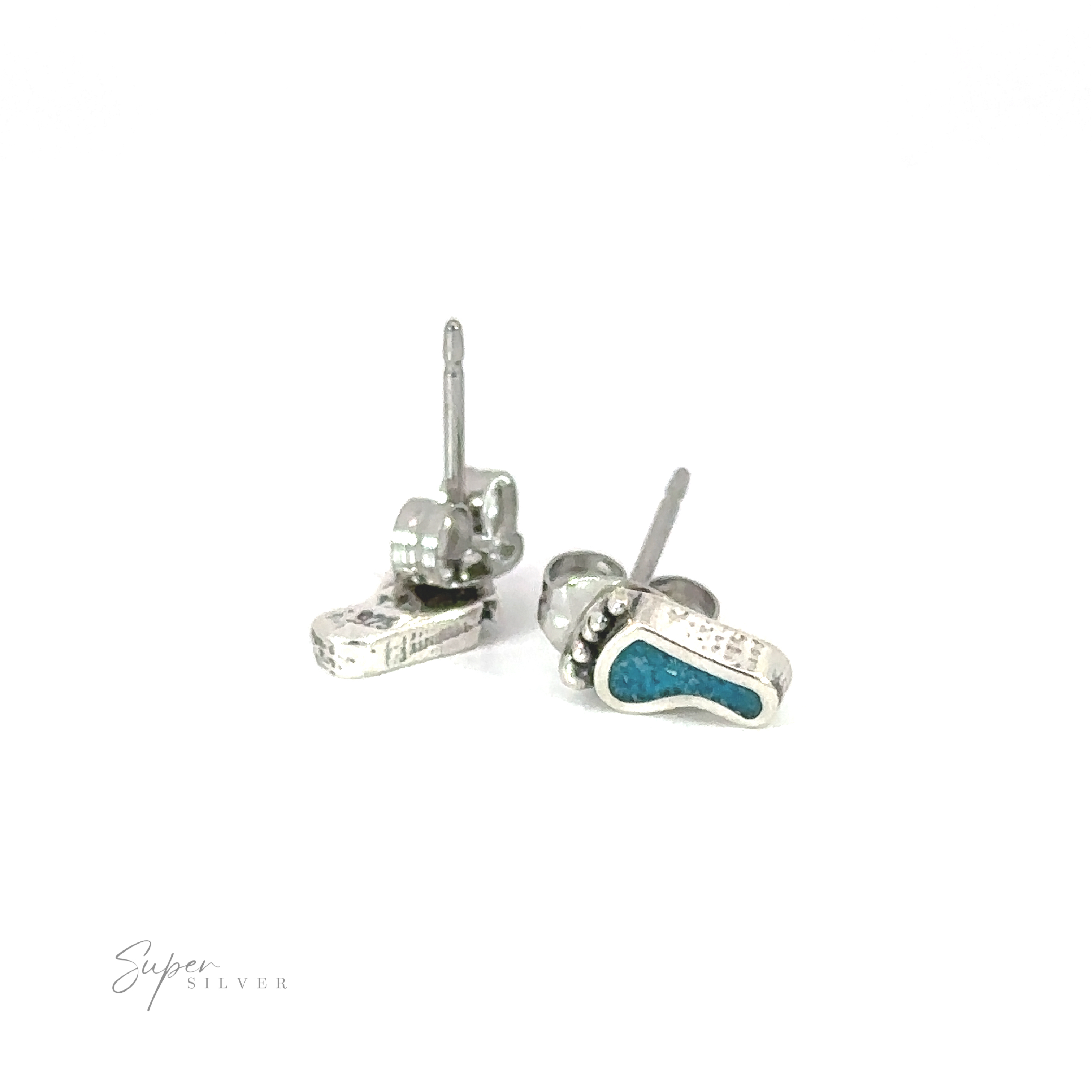 A pair of Turquoise Feet Studs on a white background.