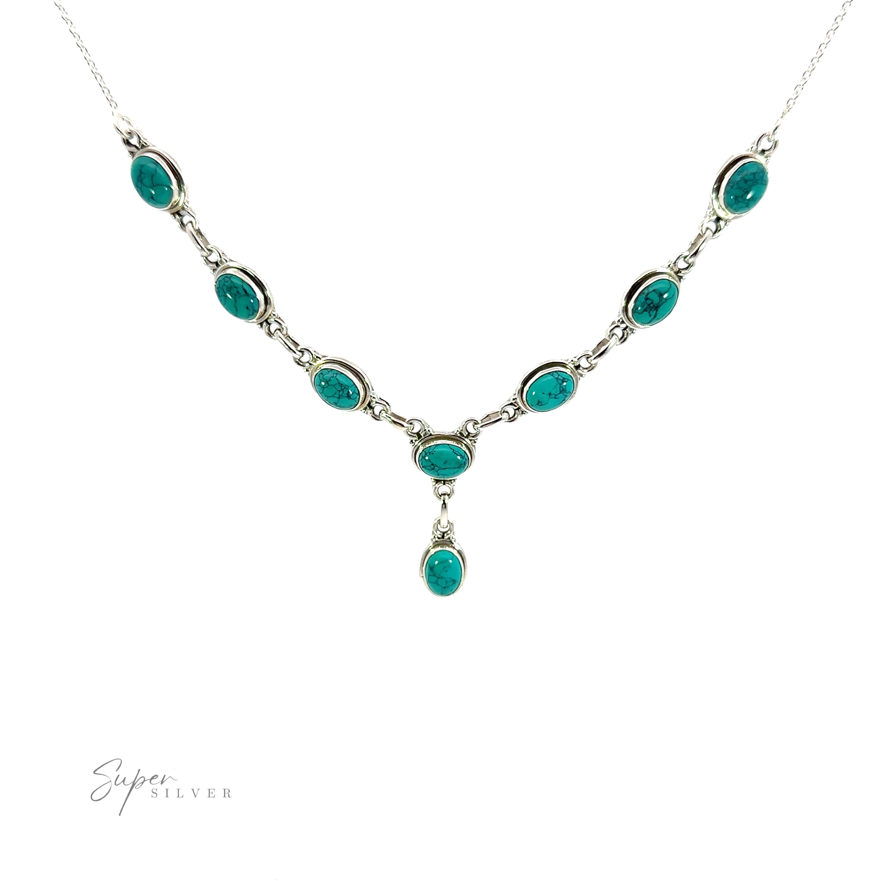 A Simple Oval Y Necklace with Gemstones featuring multiple green oval gemstones arranged in a symmetrical pattern, with one hanging stone in the center. The words "Super Silver" are present in the bottom left corner, adding a touch of bohemian charm.