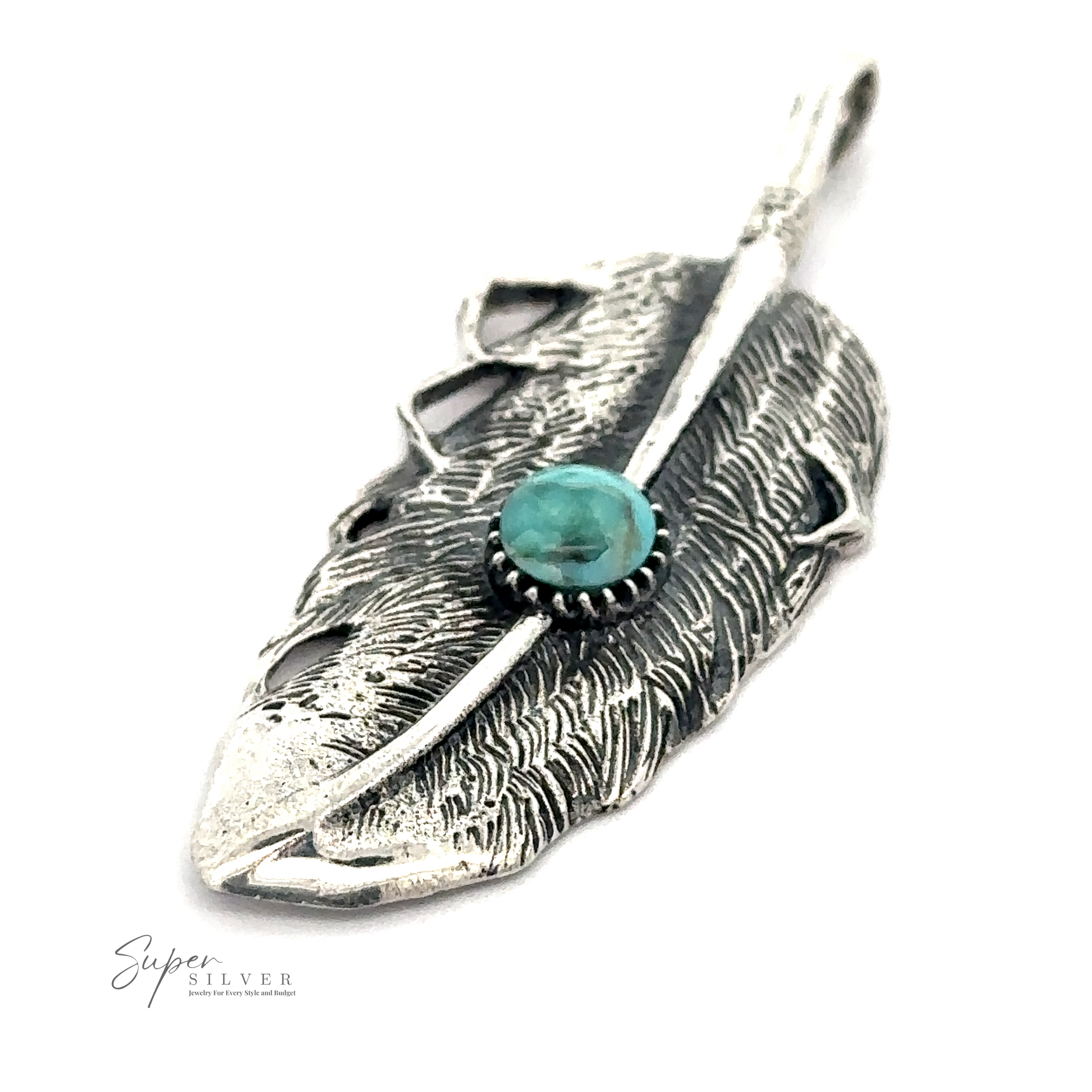 A Native Inspired Feather Pendant With Turquoise with intricate detailing and a natural turquoise stone accent in the center. The Native-inspired feather design is complemented by the brand name "Super Silver," visible in the bottom left corner.