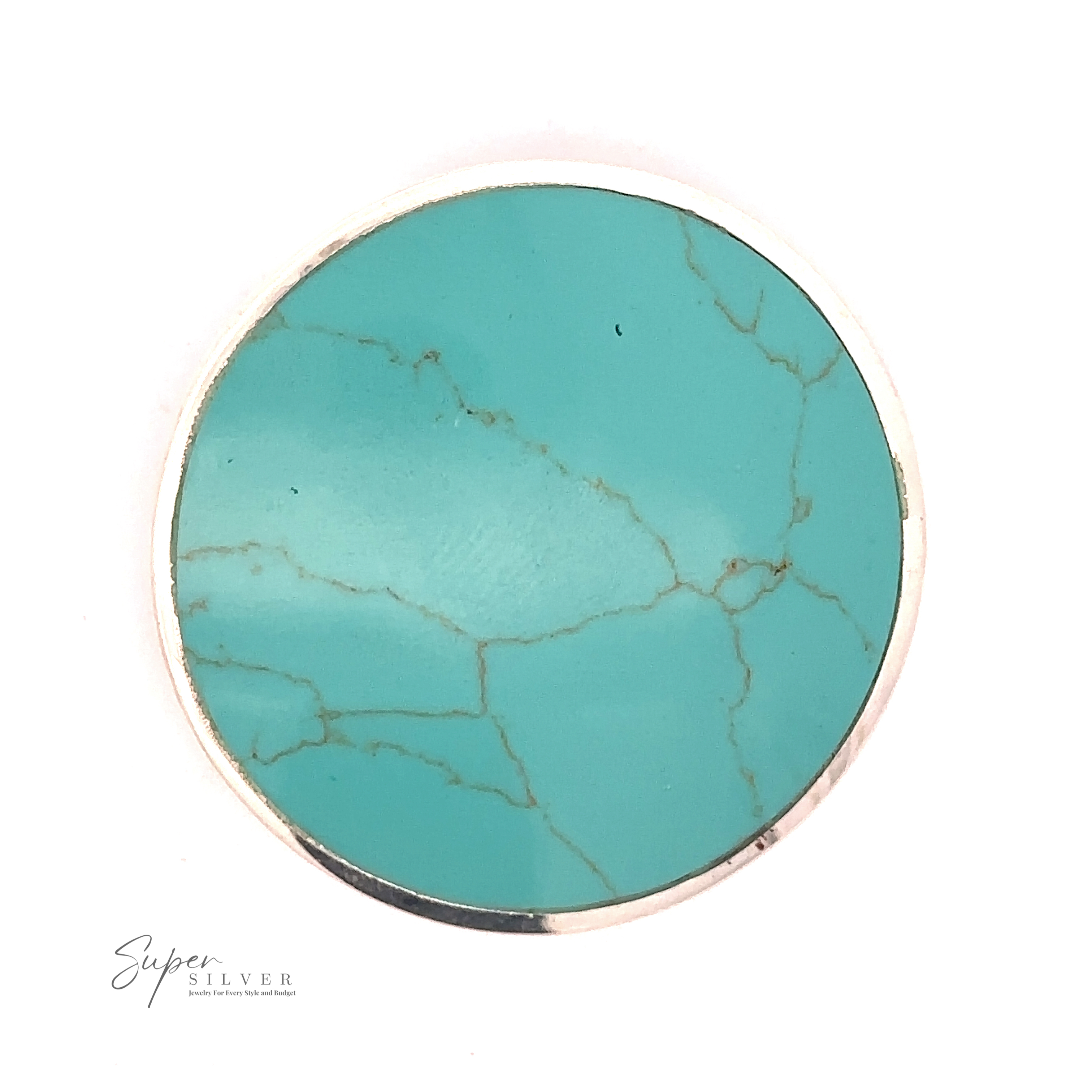 A round turquoise stone with natural veins, bordered by a thin silver rim. The Large Round Turquoise Pendant boasts the "Super Silver" logo in the bottom left corner.