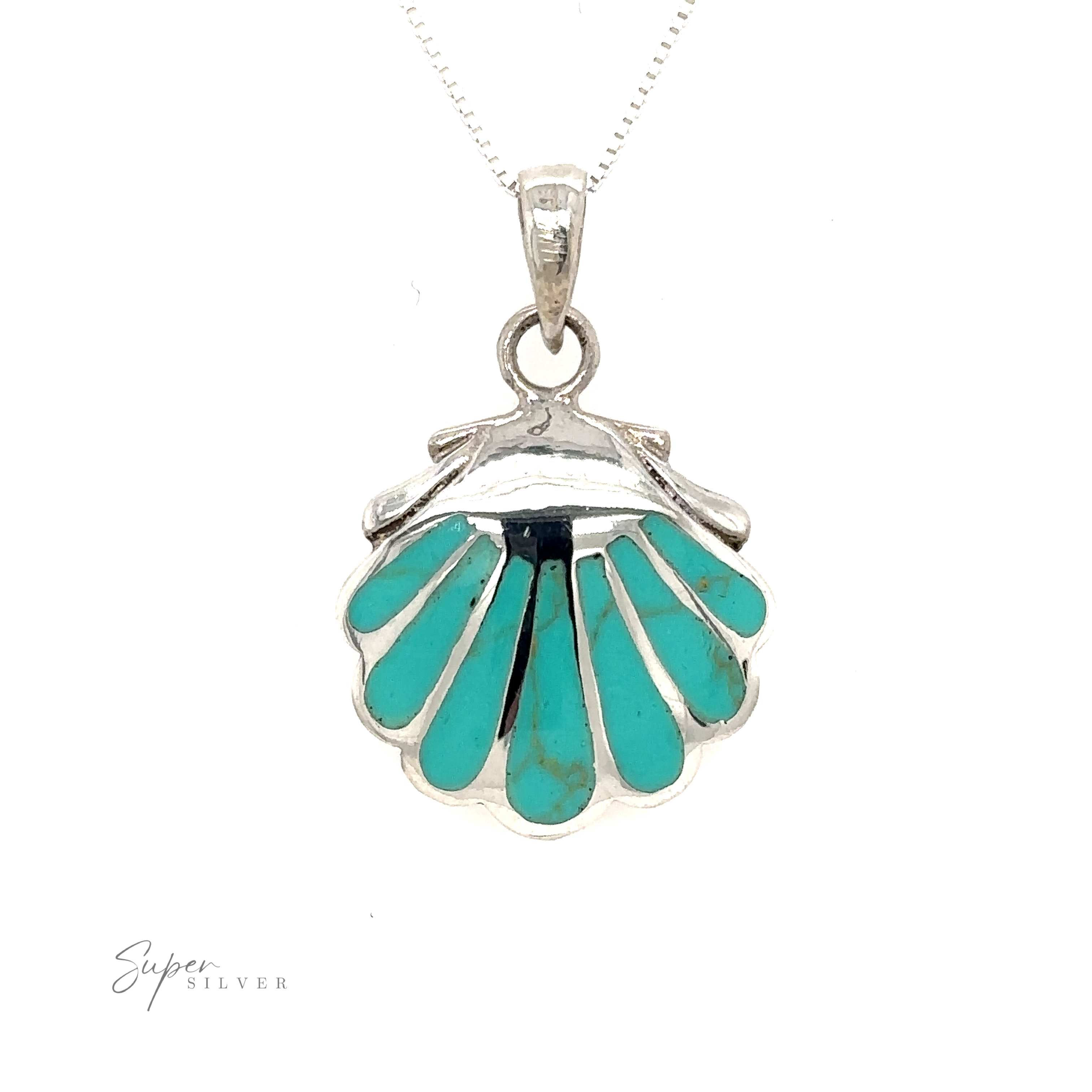 A Clam Shell Pendant, featuring inlay stones, beautifully showcased on a silver chain.