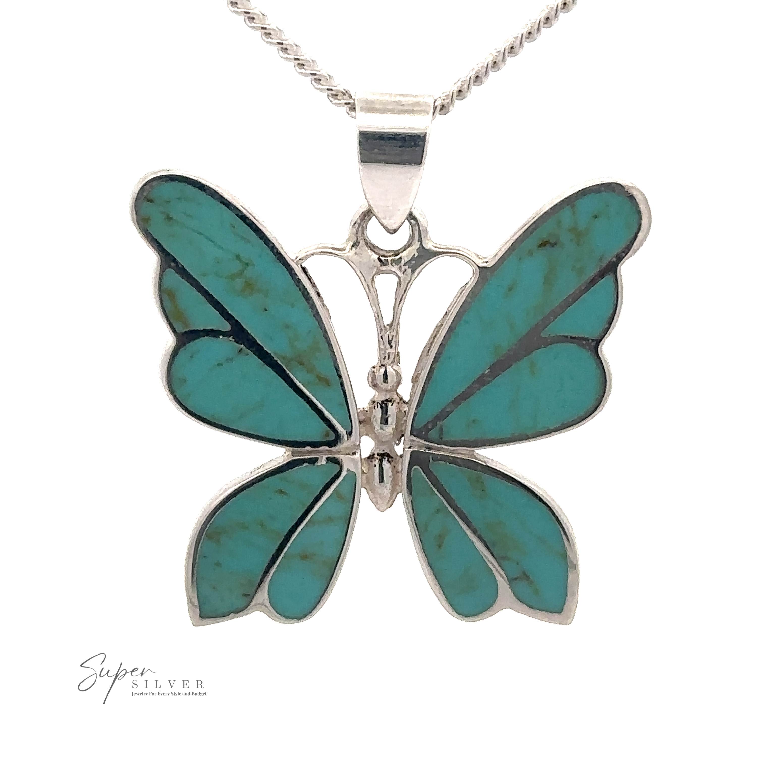 A Medium Inlay Butterfly Pendant hangs gracefully from a chain. This exquisite butterfly pendant features detailed wing designs and is elegantly photographed on a plain white background, making it a standout piece of gemstone jewelry.