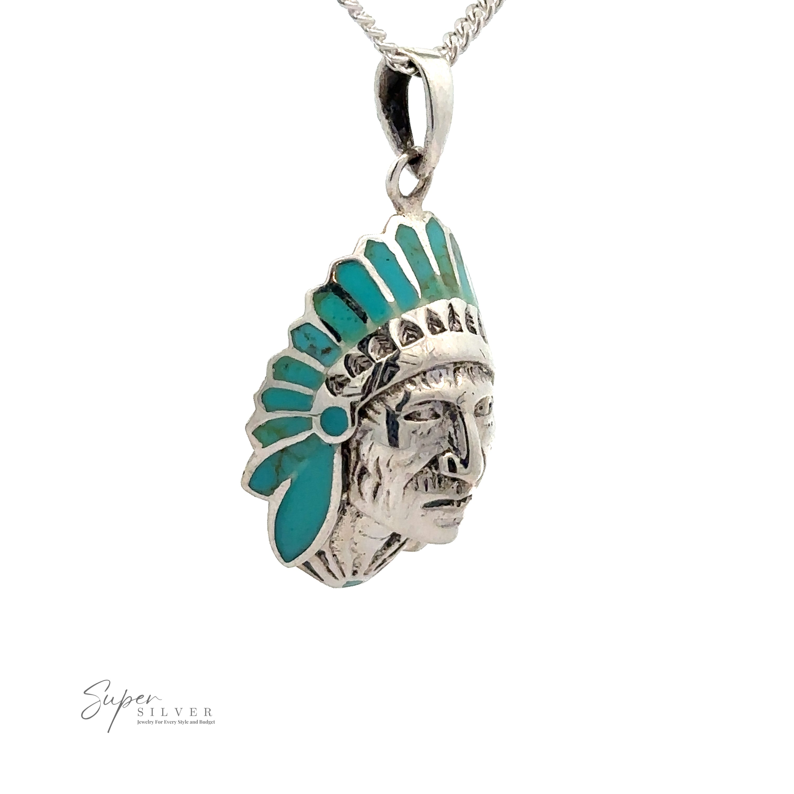 This .925 Sterling Silver necklace features a detailed Turquoise Chief Head Pendant adorned with turquoise stones in the headdress. The pendant is suspended from a silver chain.