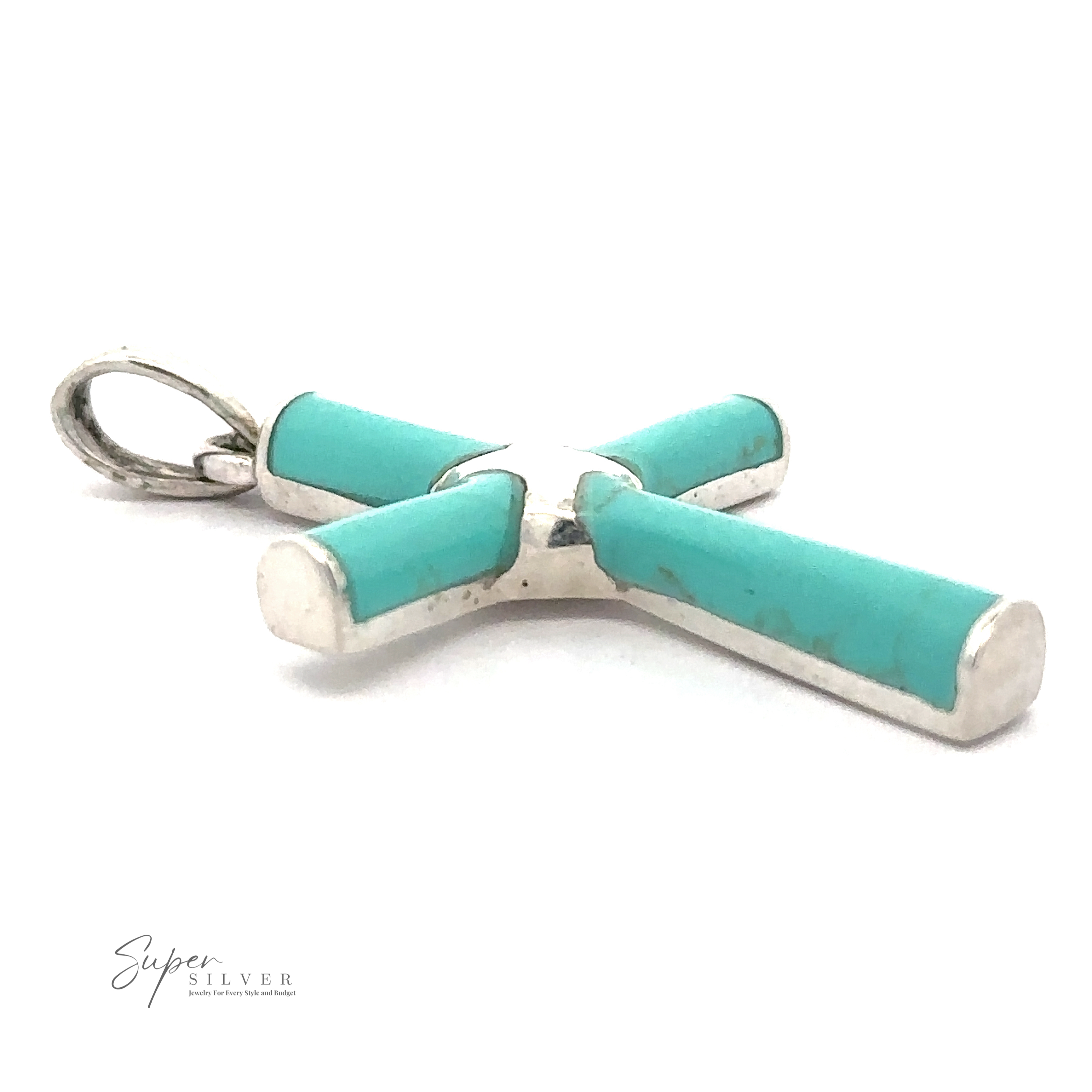 A simple Turquoise Cross Pendant with .925 Sterling Silver accents, featuring cylindrical turquoise inlays. The loop at the top allows the pendant to be easily attached to a necklace.