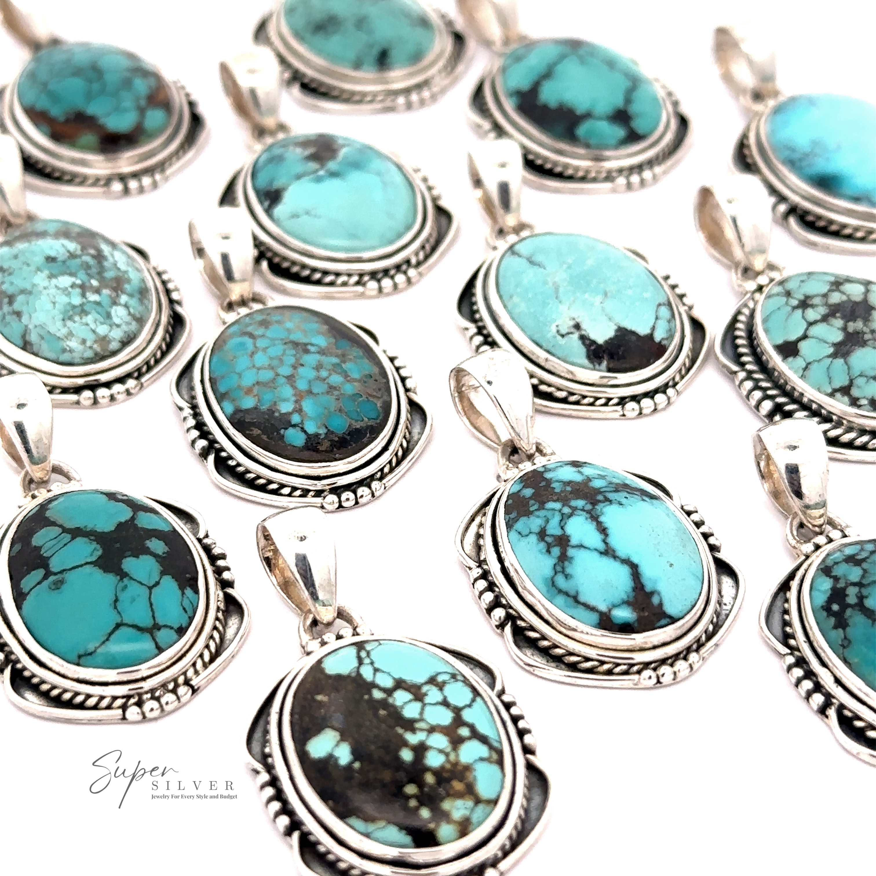The Natural Turquoise Pendant with an Oval Shield Setting features sterling silver embellishments and displays unique patterns, elegantly presented on a pristine white background.