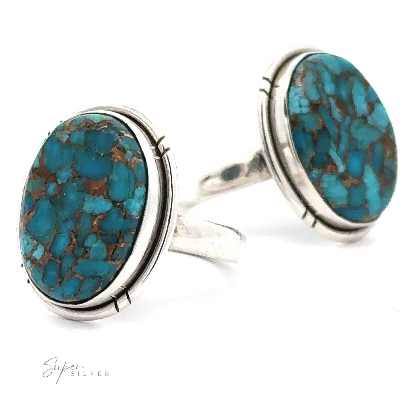 
                  
                    Two Natural Blue Copper Turquoise Rings, displaying a unique pattern of intricate marbling in blue and brown.
                  
                