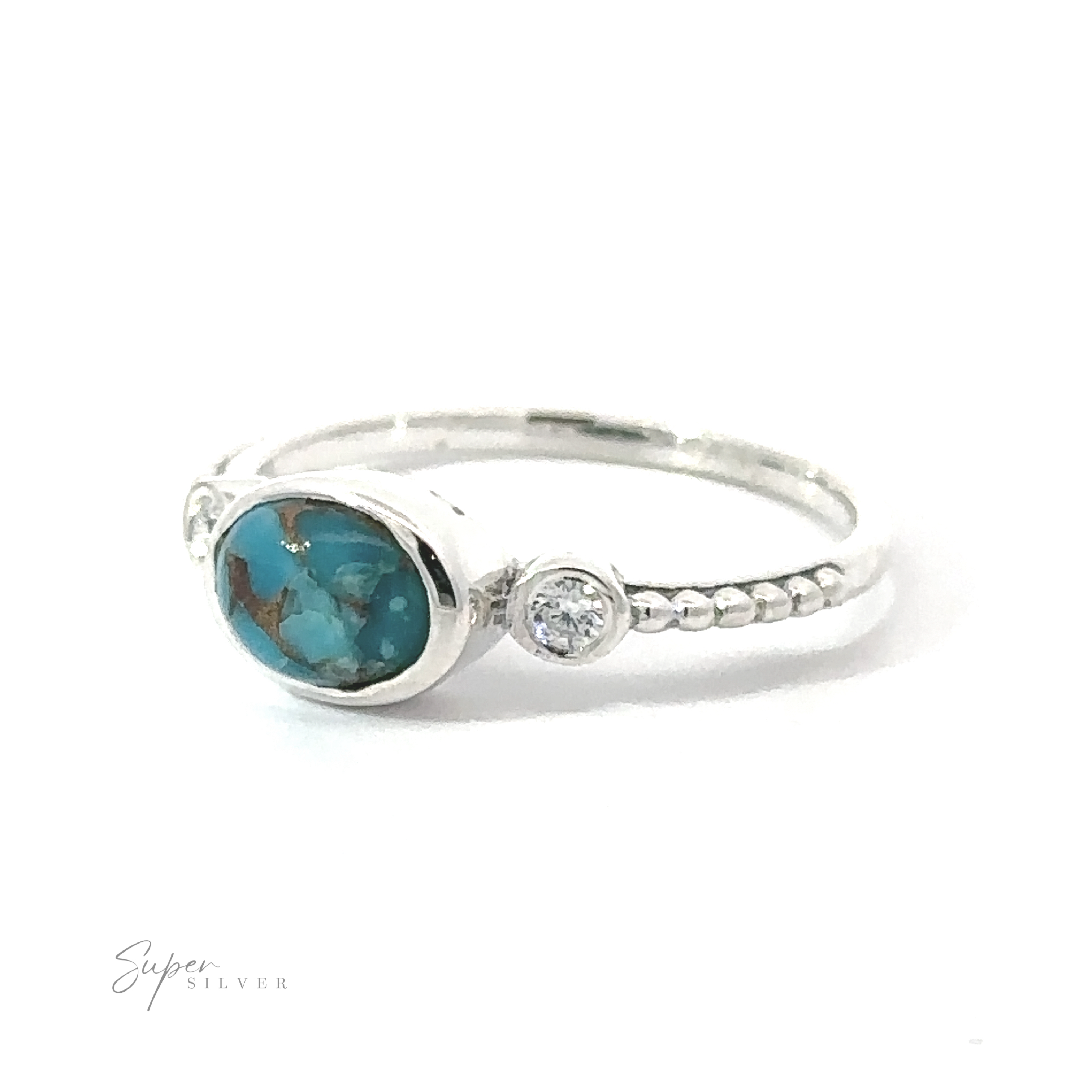 Horizontal Oval Gemstone Ring with Beaded Band featuring an oval turquoise gemstone and a small round diamond on a textured band, displayed against a white background.