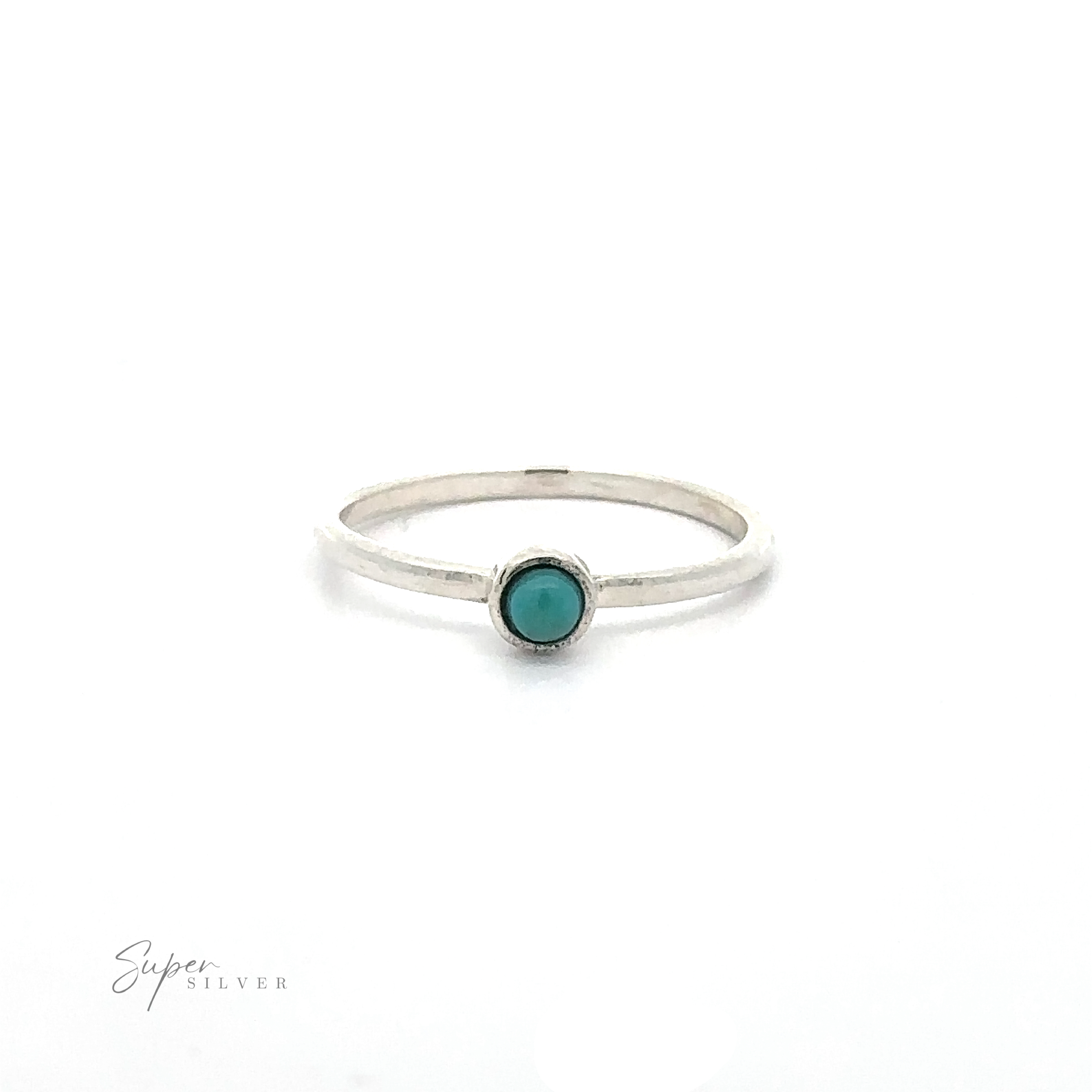 A simple silver ring with a small turquoise stone in the center, perfect for lovers of minimalist fashion. Displayed on a white background, the words "Dainty Stackable Round Gemstone Ring" are visible in the lower left corner. Ideal for stacking with other sterling silver or stackable rings.