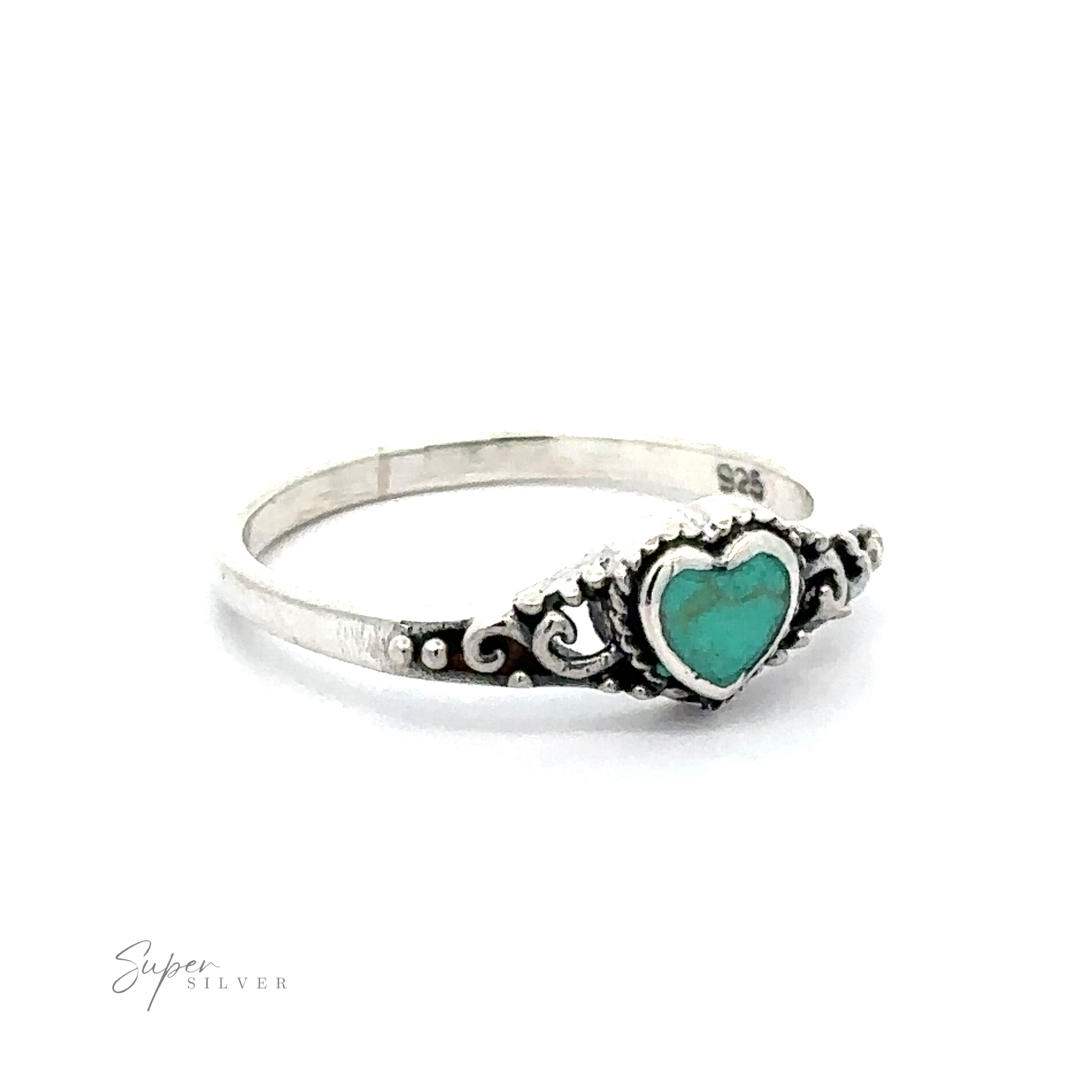 A dainty heart filigree ring with inlaid stones and a turquoise stone.