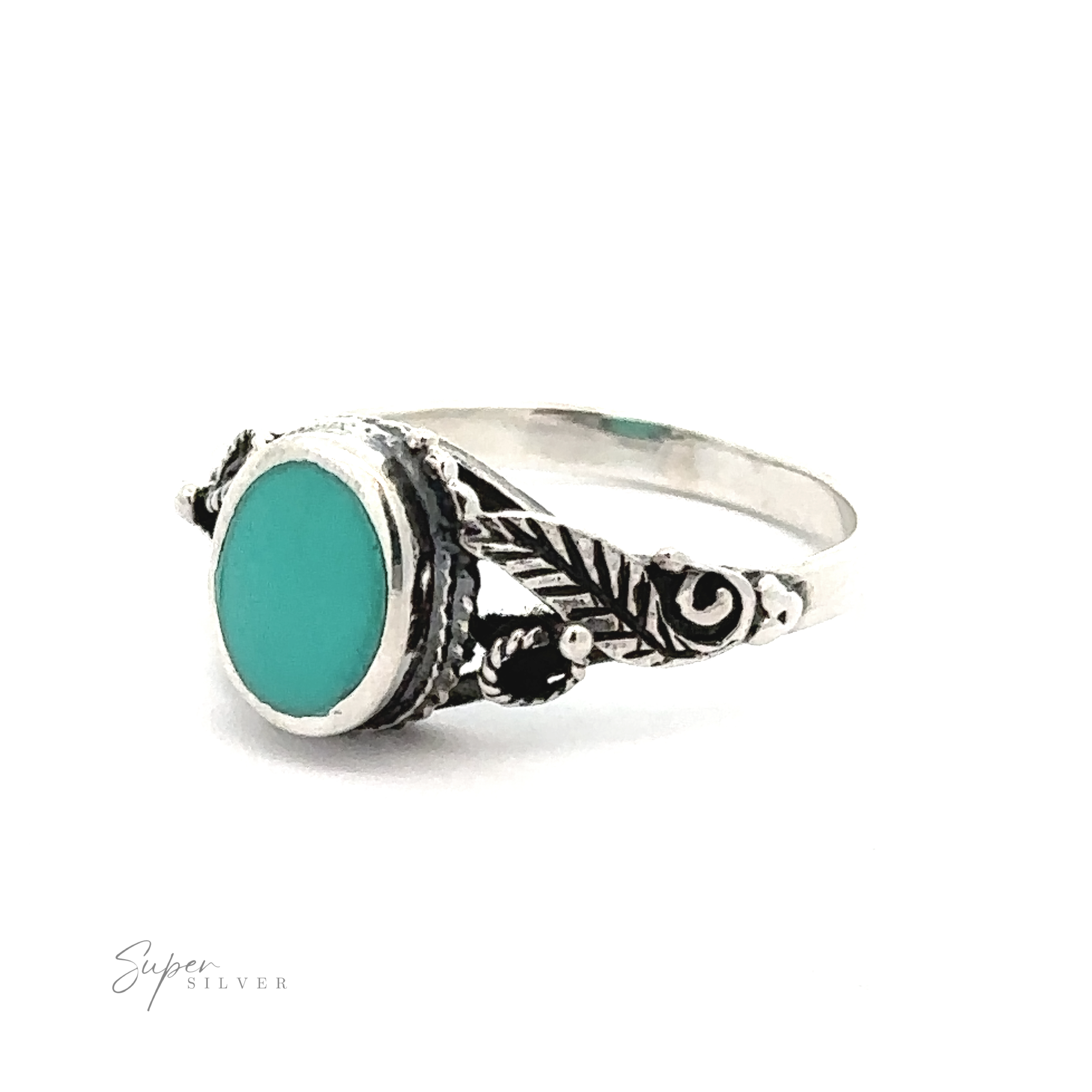A Beautiful Oval Stone Ring with Leaf Design set in .925 Sterling Silver.