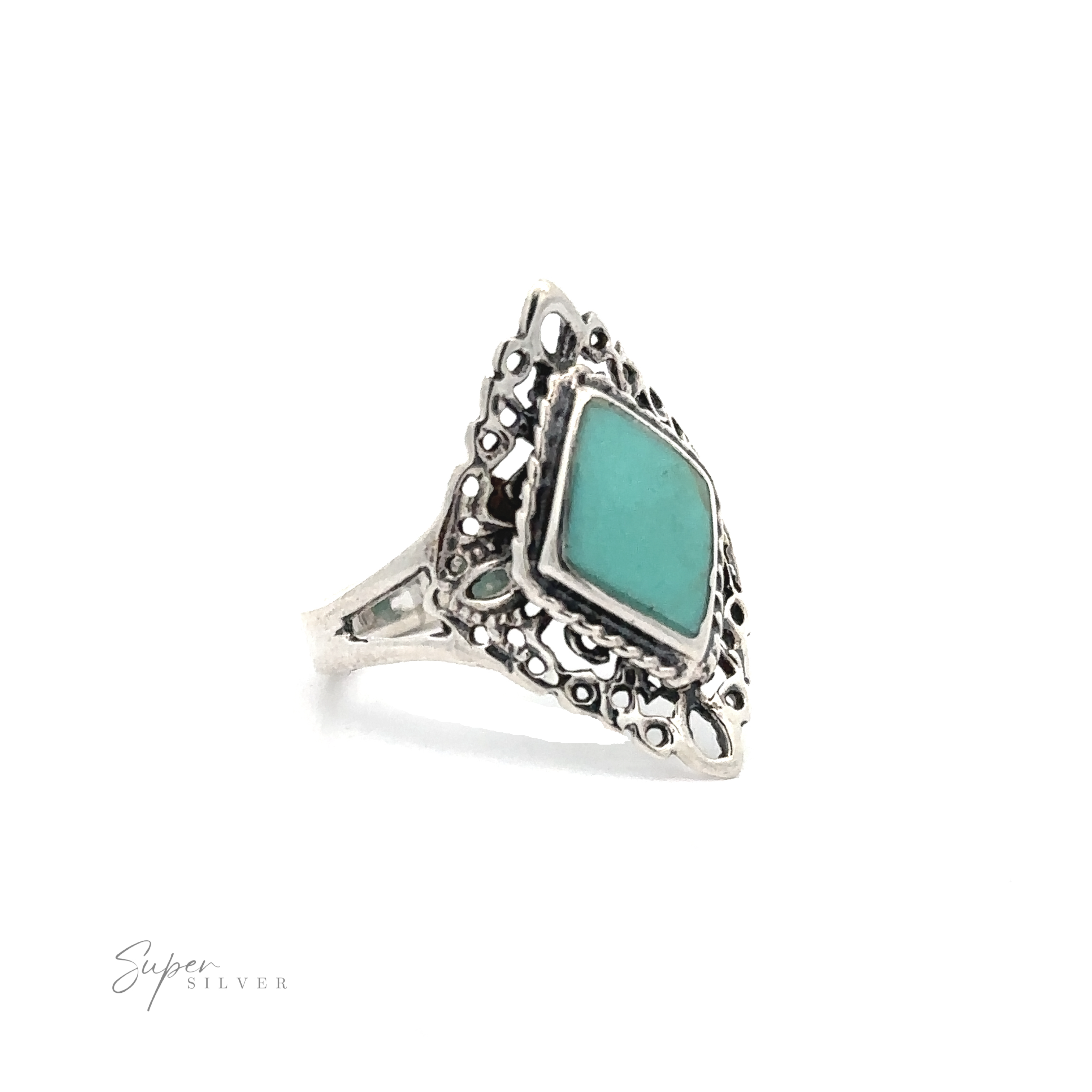 A Diamond Shaped Filigree Ring with Inlaid Stones, adorned with lacy filigree.