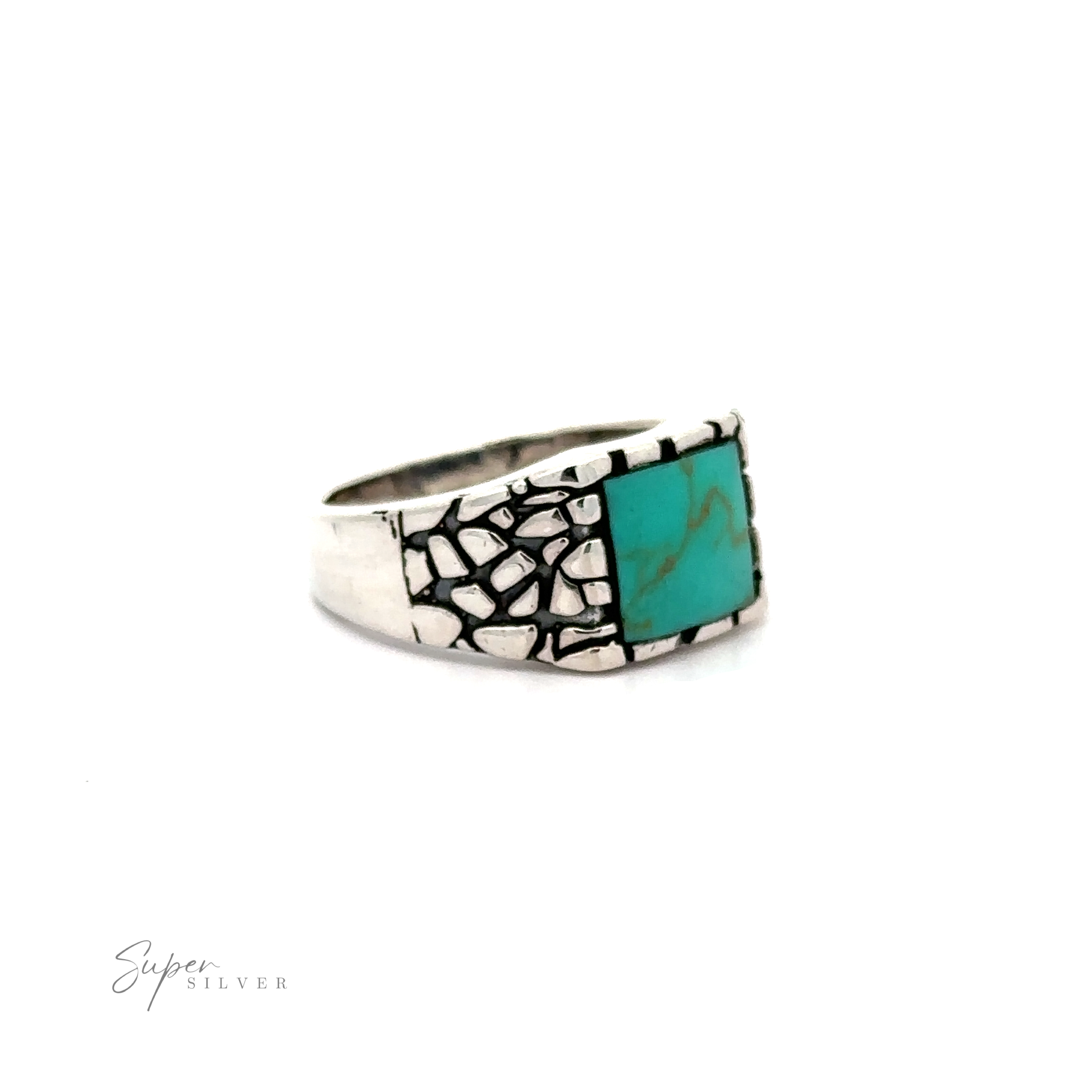 A silver stone signet ring with an inlaid turquoise stone.