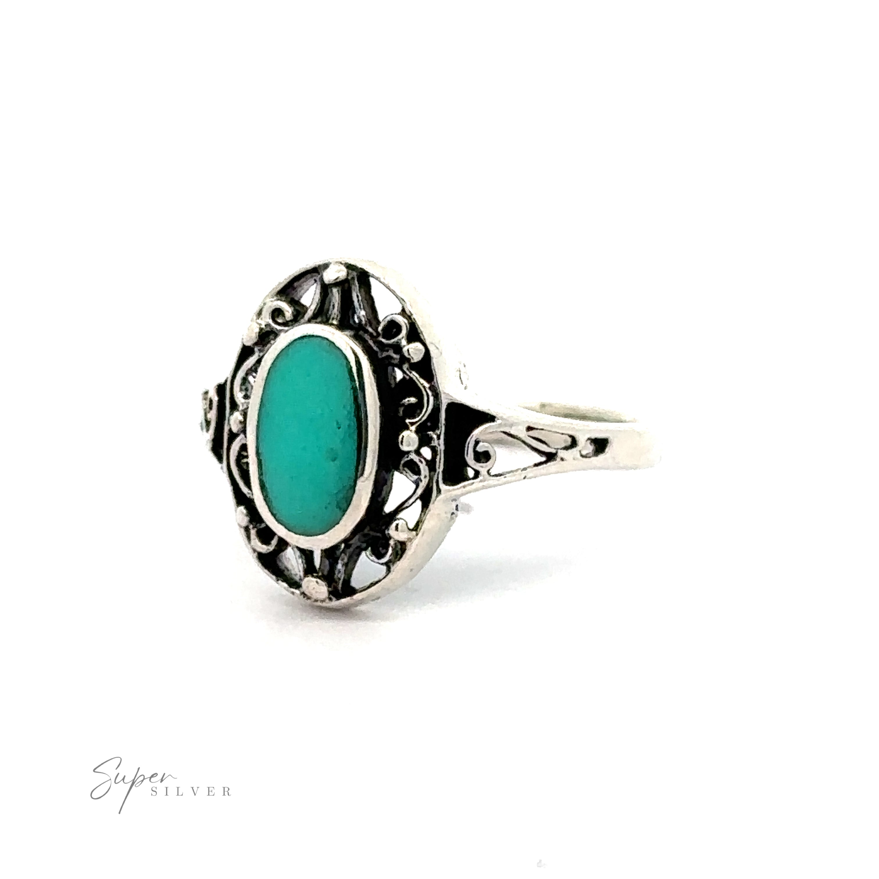 A sterling silver ring with an Oval Inlay Stone with Swirl Filigree Border.