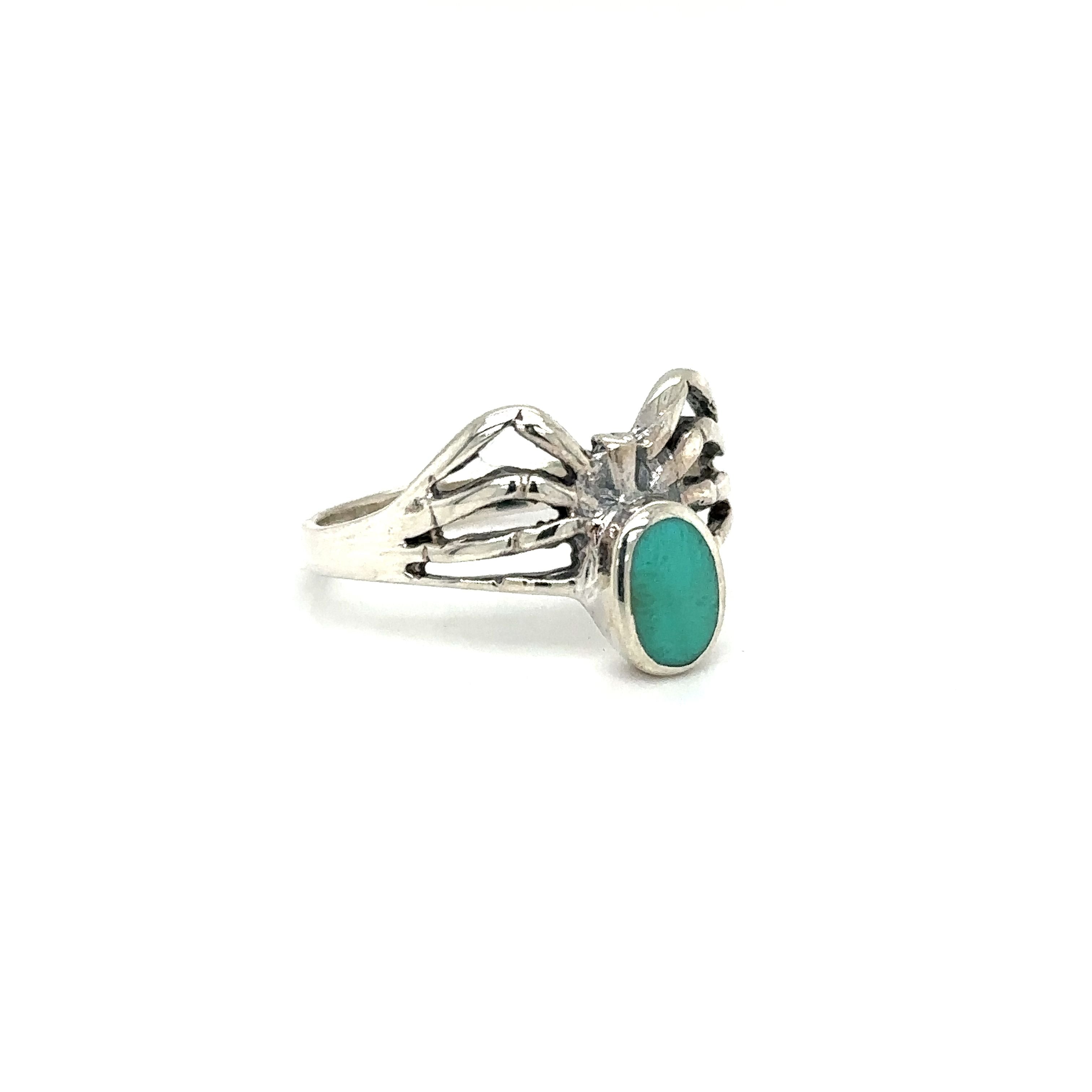 A mystical Inlay Stone Spider Ring adorned with a turquoise stone from Super Silver.