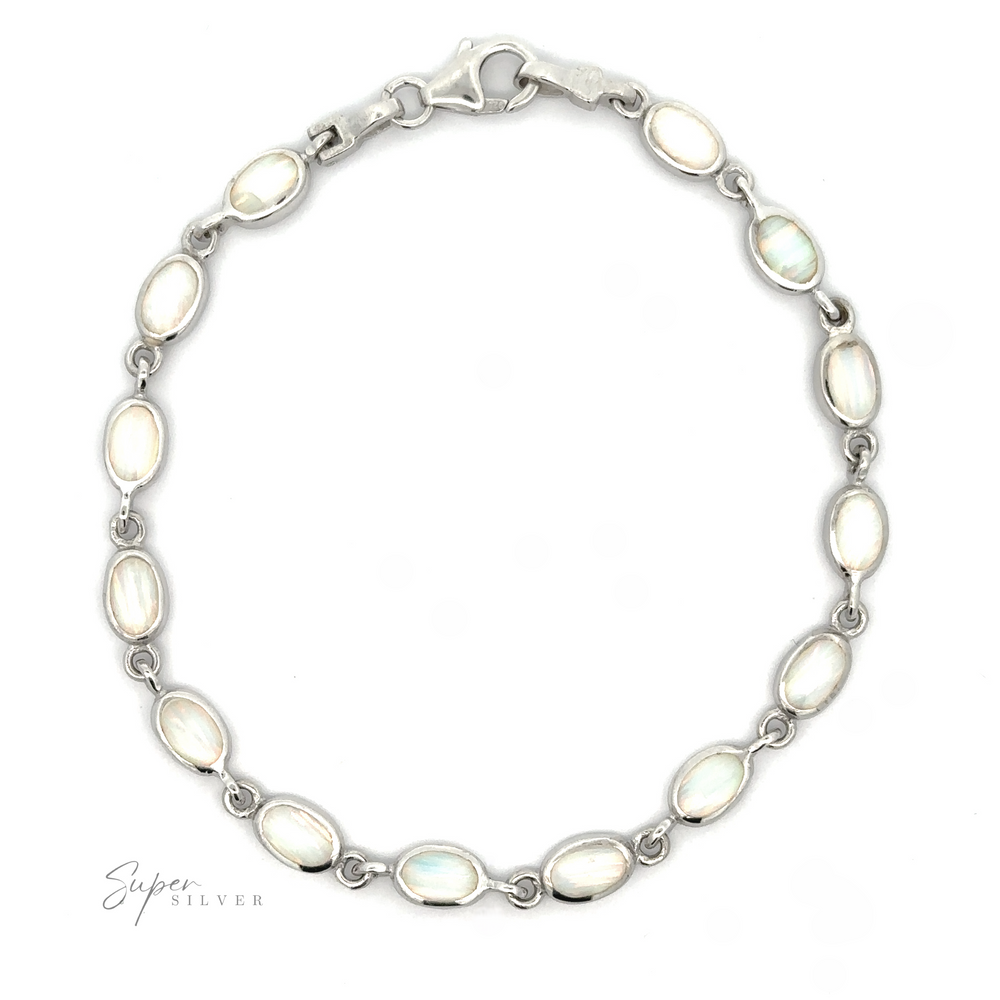 
                  
                    Simple Oval Link Opal Bracelet with oval-shaped lab-created opals inlays, connected by short links and a lobster clasp closure.
                  
                