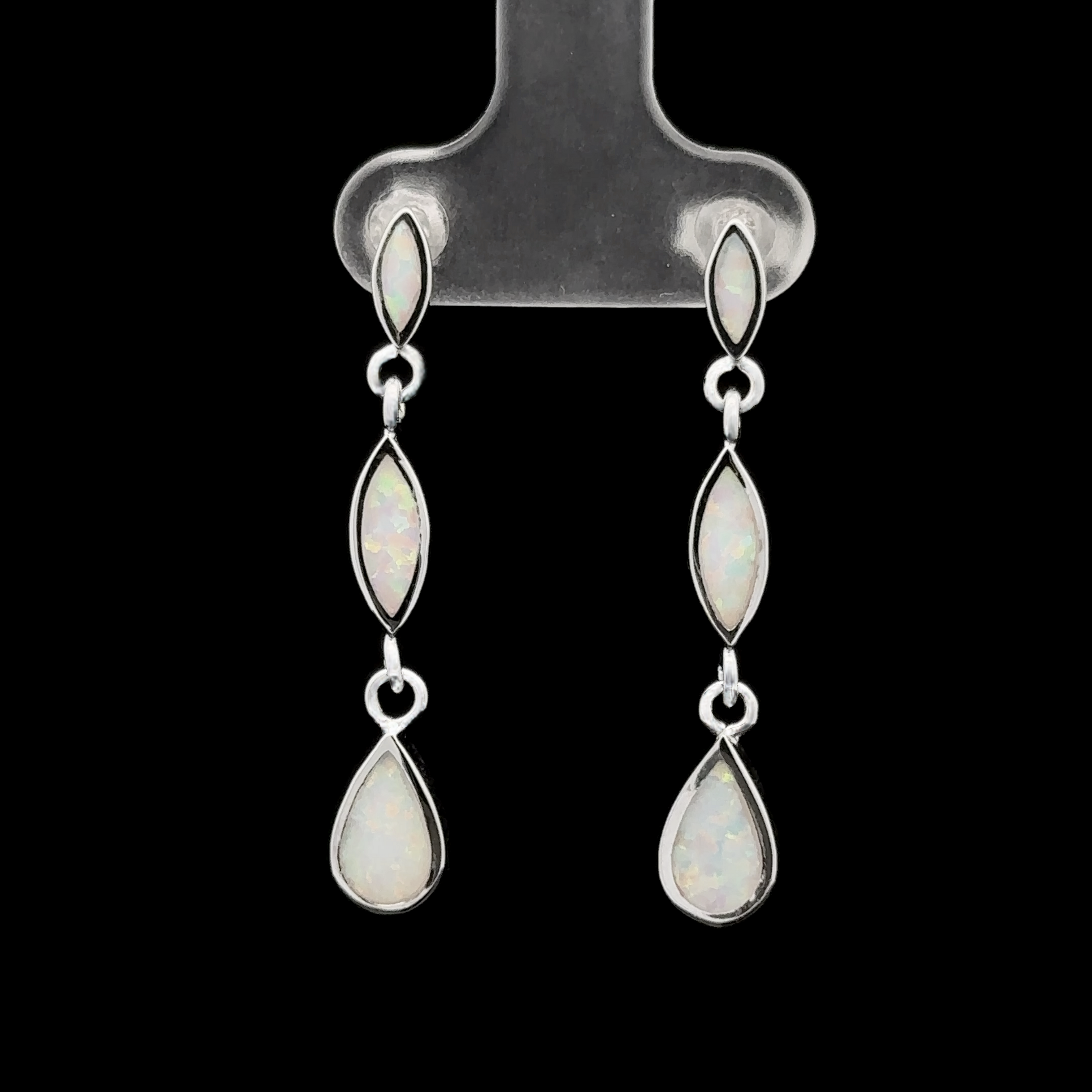 A pair of Elegant Lab-Created Opal Earrings featuring three marquise-cut lab-created opal stones and a teardrop opal stone, set in sterling silver and displayed on a black background.