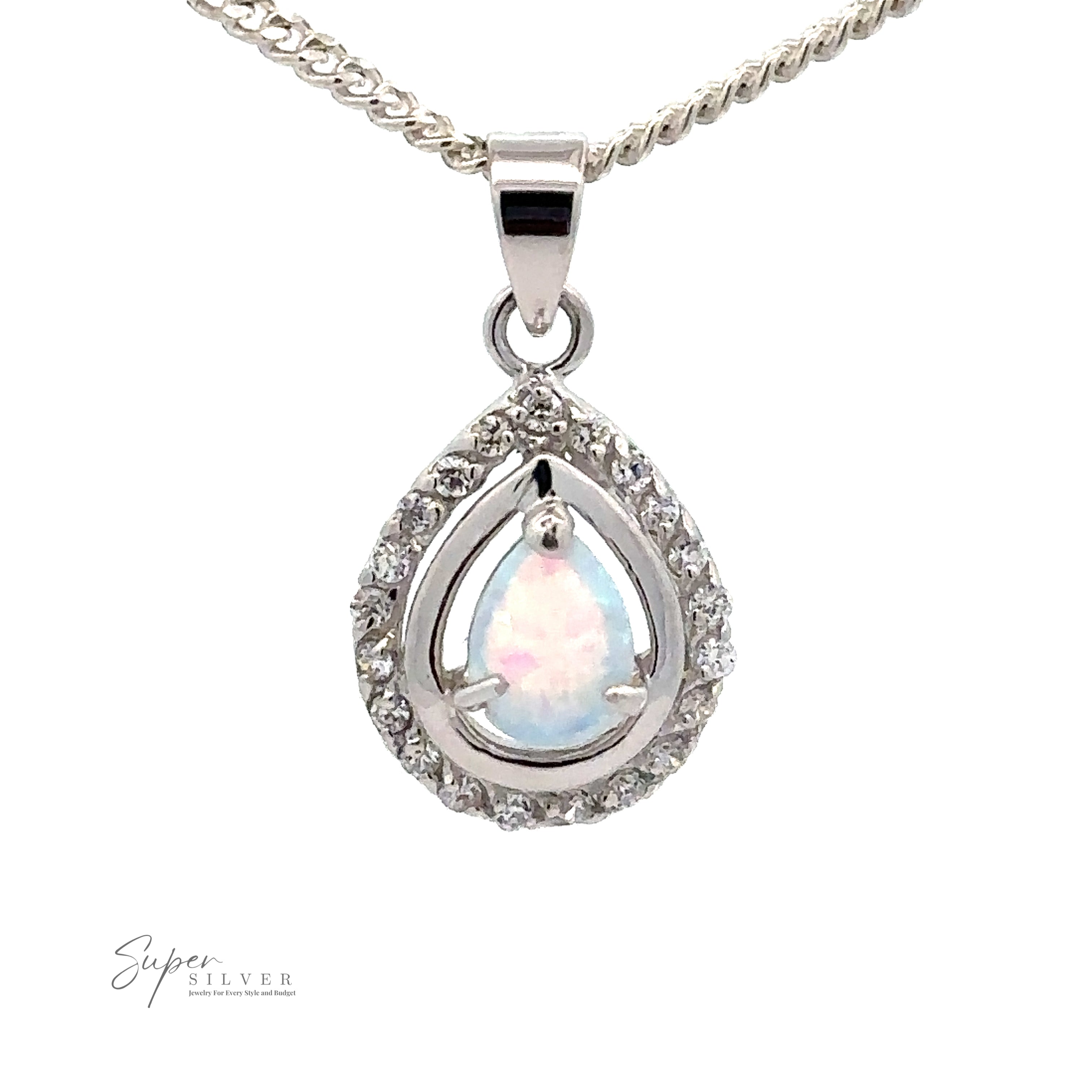 A teardrop-shaped Opal Pendants with Cubic Zirconia, adorned with small cubic zirconia stones on a silver chain. The design evokes Art Deco jewelry charm. The "Super Silver" logo graces the bottom-left corner.