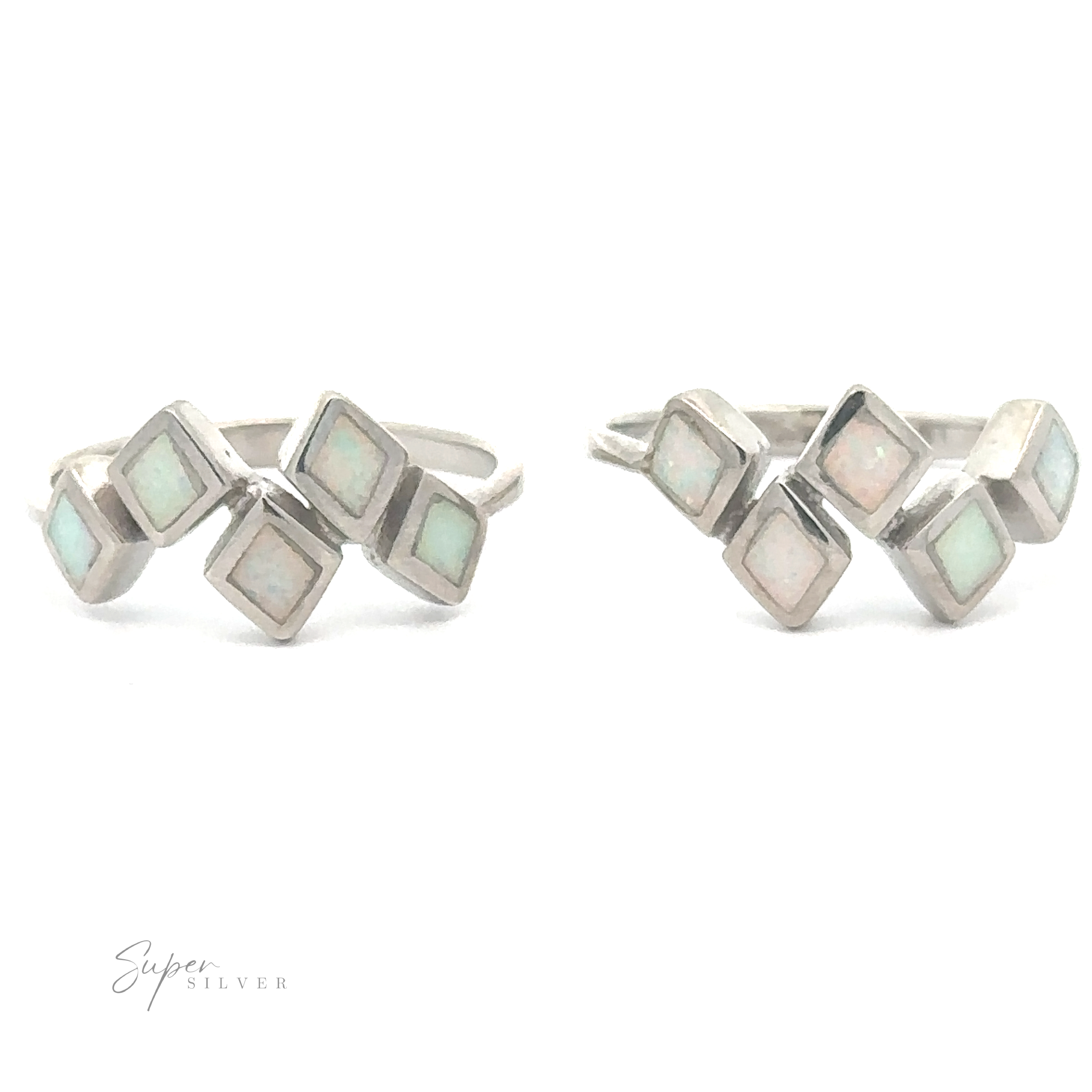 A pair of sterling silver Diamond Pattern Lab-Created Opal Rings, displayed against a white background, viewed from slightly different angles.