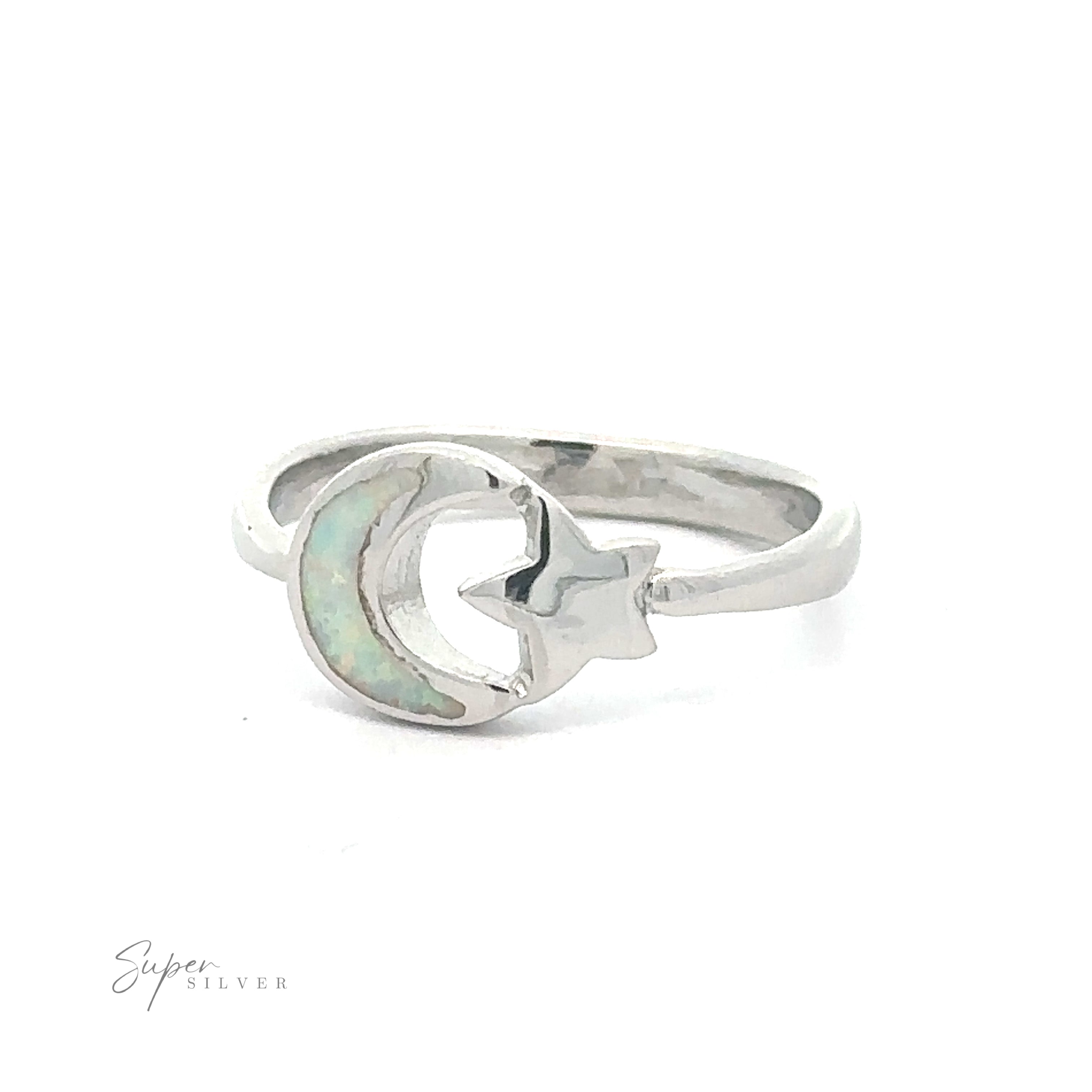 Celestial jewelry: Moon and Star Ring with Lab-Created Opal on a white background.