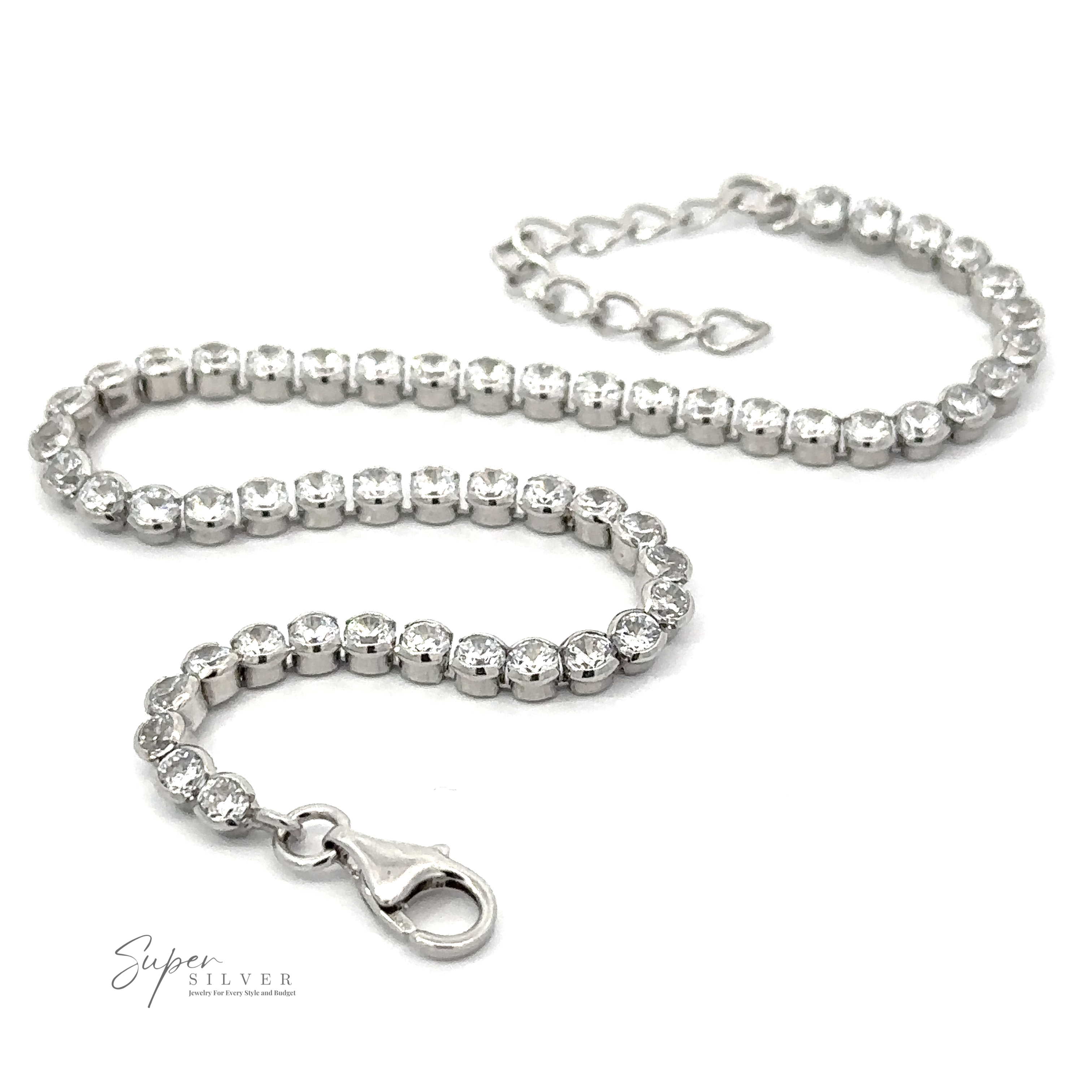 A stunning Round Cubic Zirconia Tennis Bracelet featuring round, clear gemstones and a lobster claw clasp, this rhodium plated piece is crafted from .925 sterling silver.
