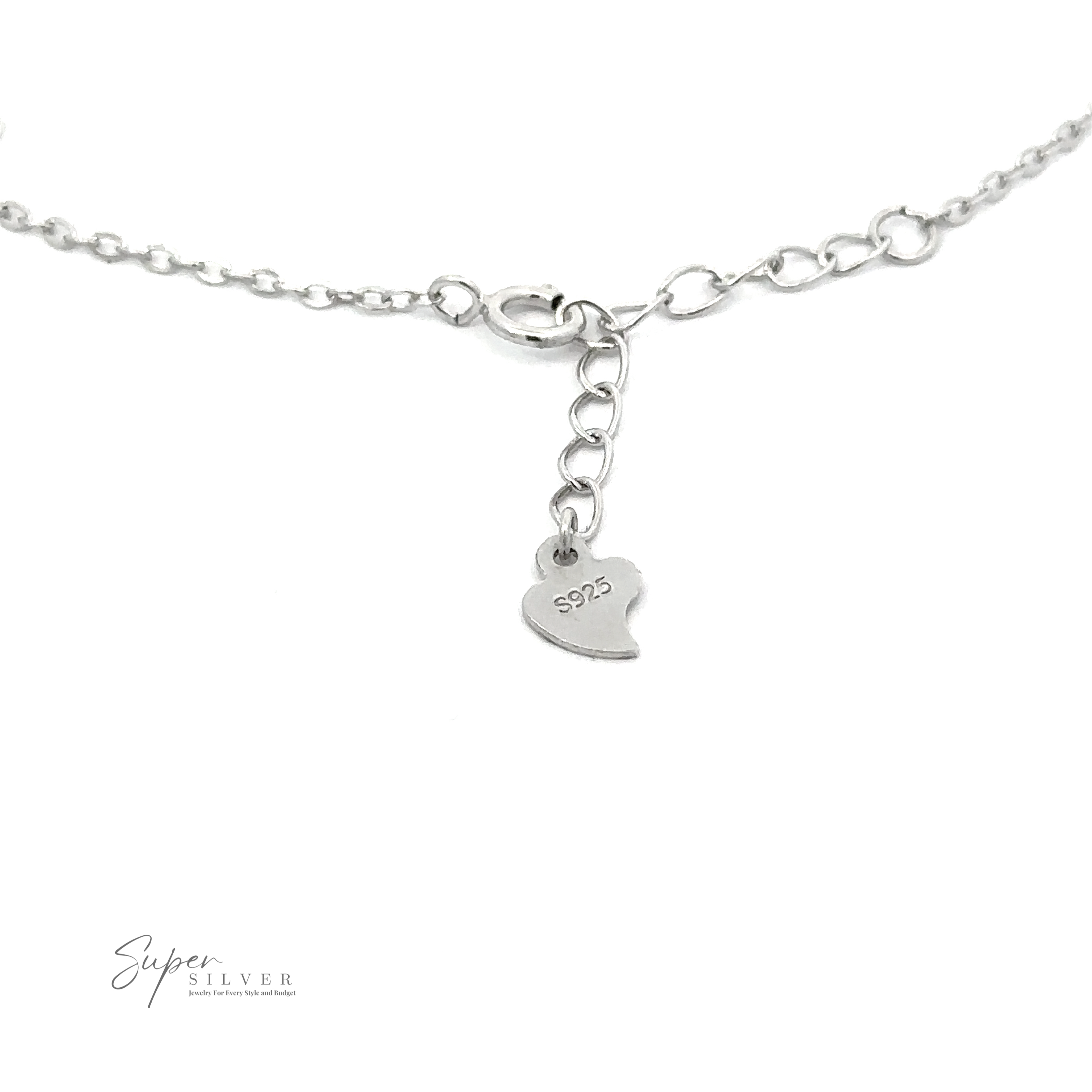 A sterling silver necklace with a heart-shaped tag engraved with "S925." The tag dangles from an adjustable chain with a lobster clasp. The design pairs perfectly with our adjustable Dainty Cubic Zirconia Evil Eye Bracelet. The "Super Silver" logo is in the bottom left corner.