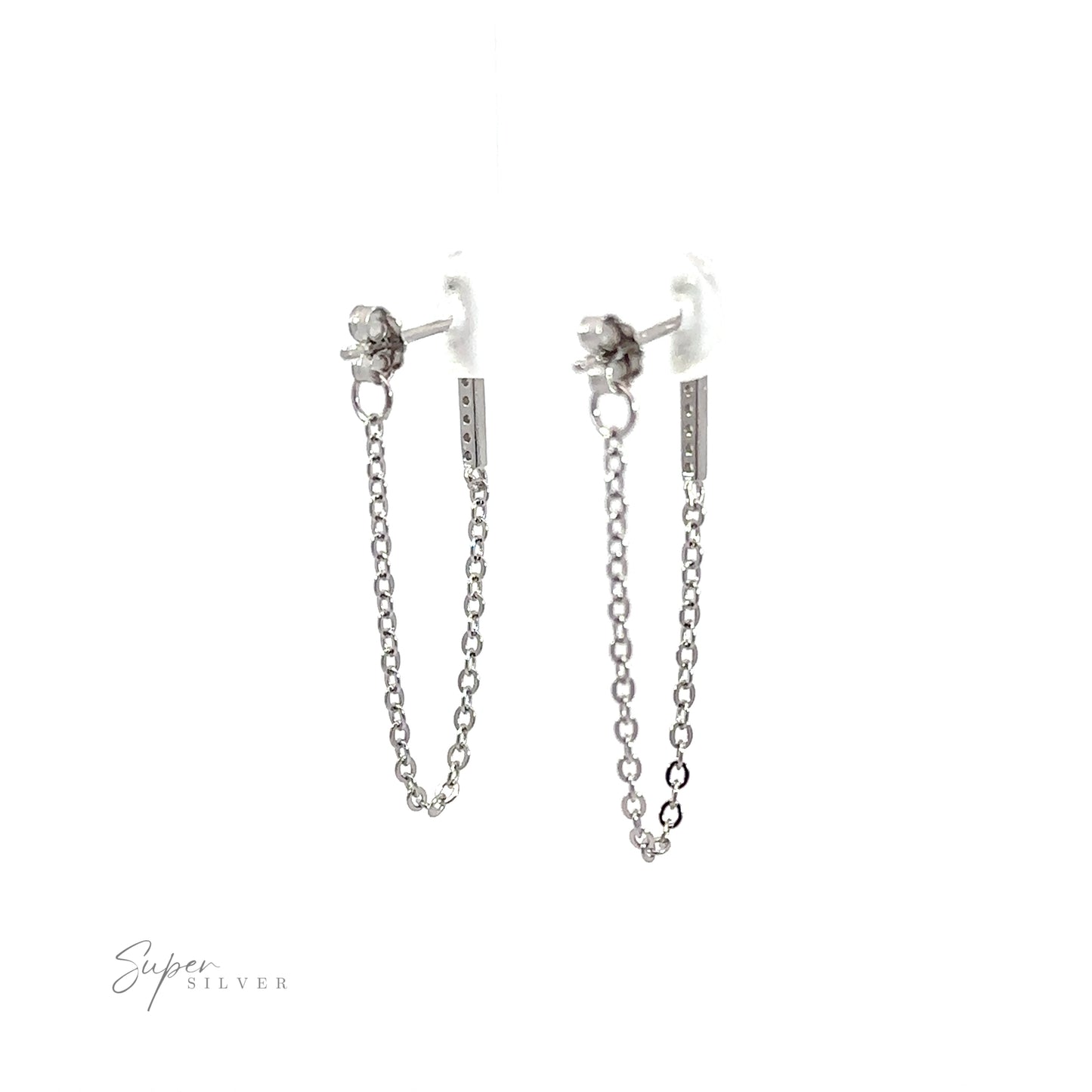 
                  
                    A pair of CZ bar studs with chain earrings with a minimalist design featuring cubic zirconia accents.
                  
                