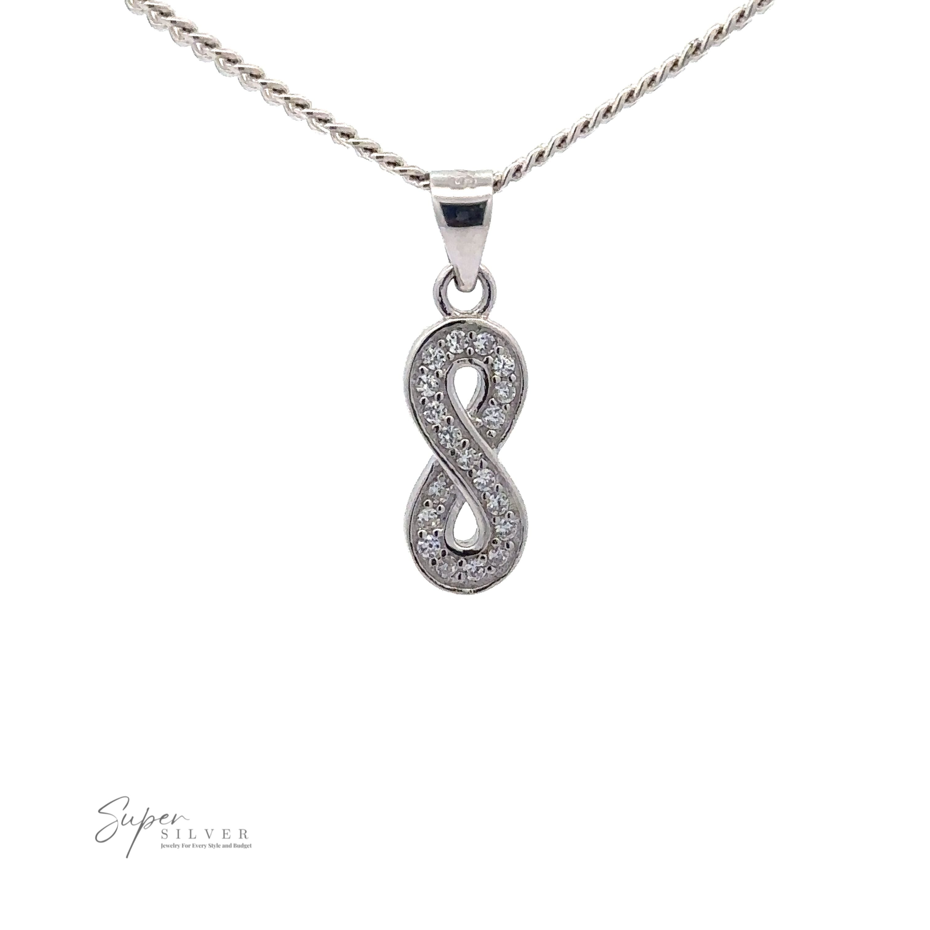 A Cubic Zirconia Infinity Pendant encrusted with small cubic zirconia gemstones, hanging from a silver chain. The logo "Super Silver" is visible in the bottom left corner.