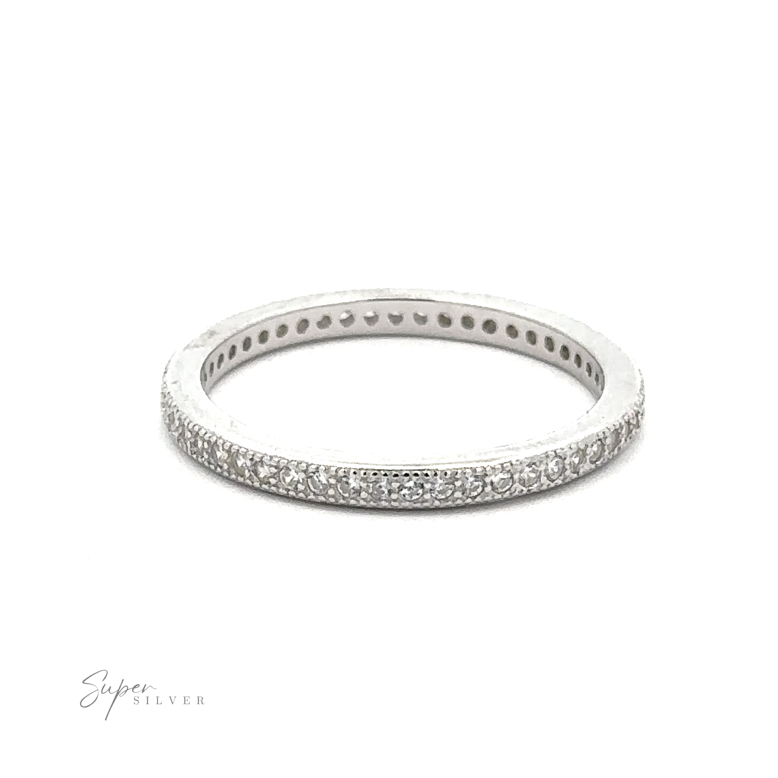 A Classic Pave Cubic Zirconia Eternity Ring with a row of small, sparkling cubic zirconia stones set into the band. The half-eternity ring is thin and has a clean, polished finish. The brand logo "Super Silver" is visible in the bottom left corner.