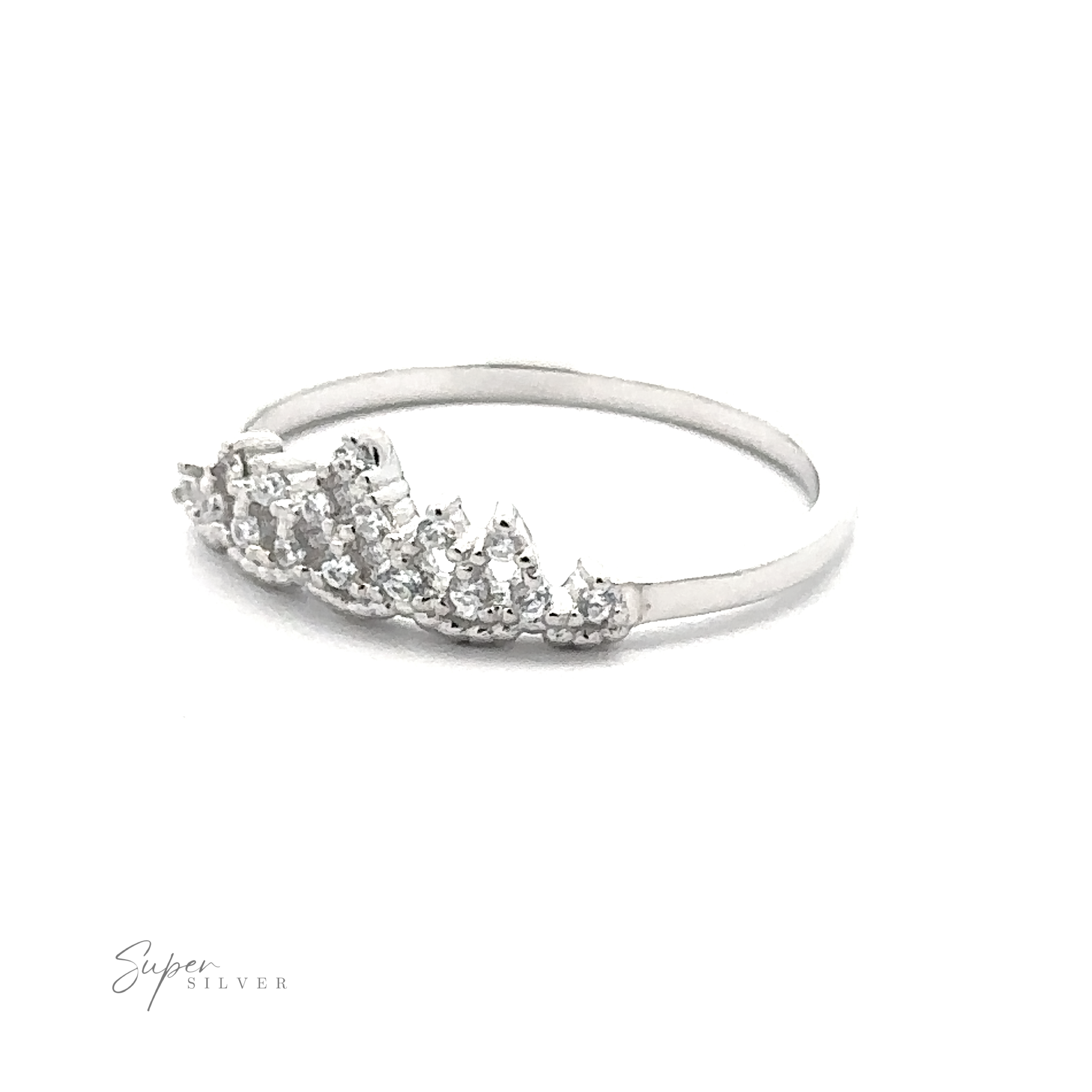 The Dainty Cubic Zirconia Crown Ring is delicately crafted from sterling silver, showcasing a tiara-like design adorned with small, clear cubic zirconia gemstones on one side. The brand name "Super Silver" is elegantly positioned in the lower left corner.