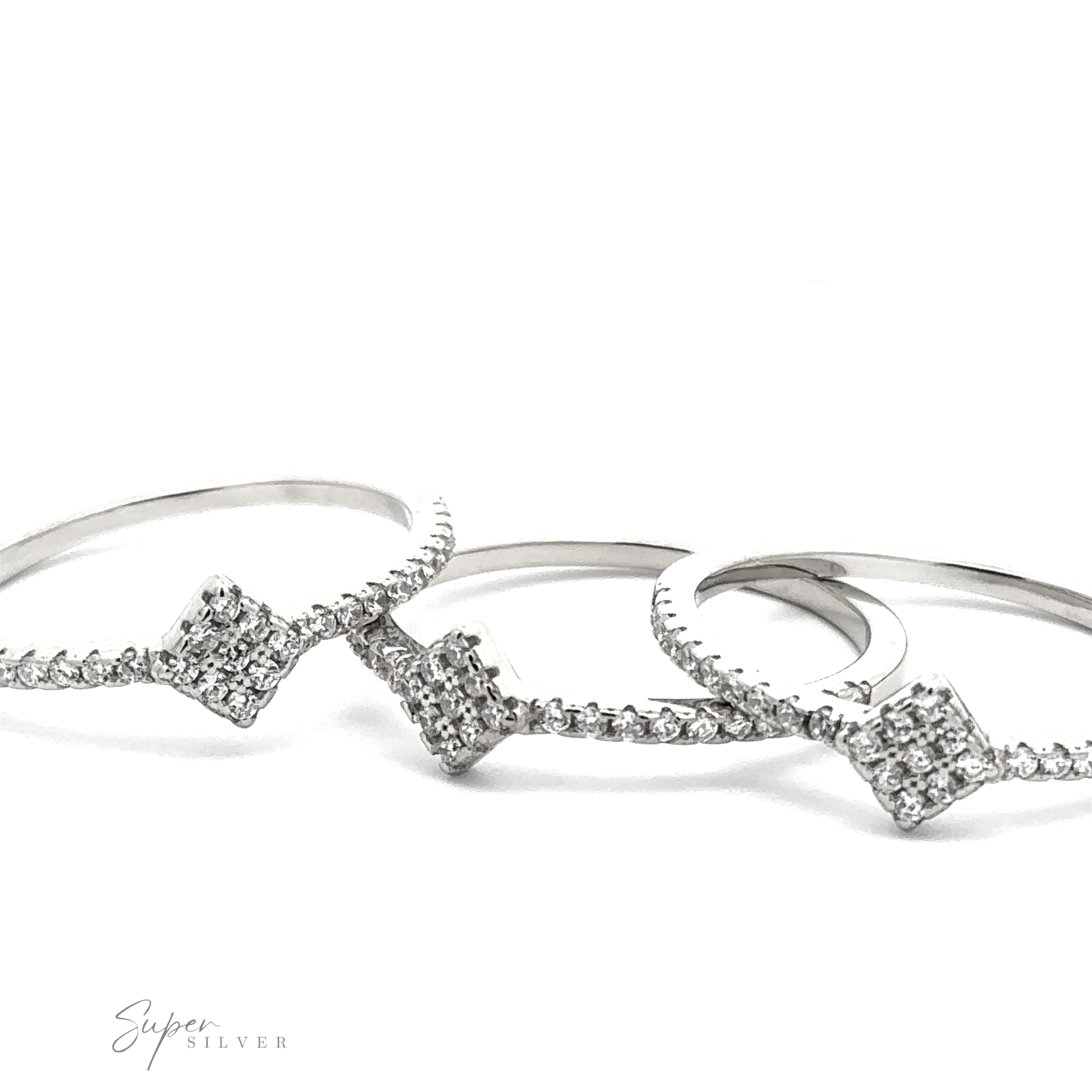 Three Tiny Pave Cubic Zirconia Diamond-Shaped Rings, each featuring square-shaped clusters of tiny pave cubic zirconia, arranged in an overlapping fashion. The words "Super Silver" are visible in the bottom left corner.