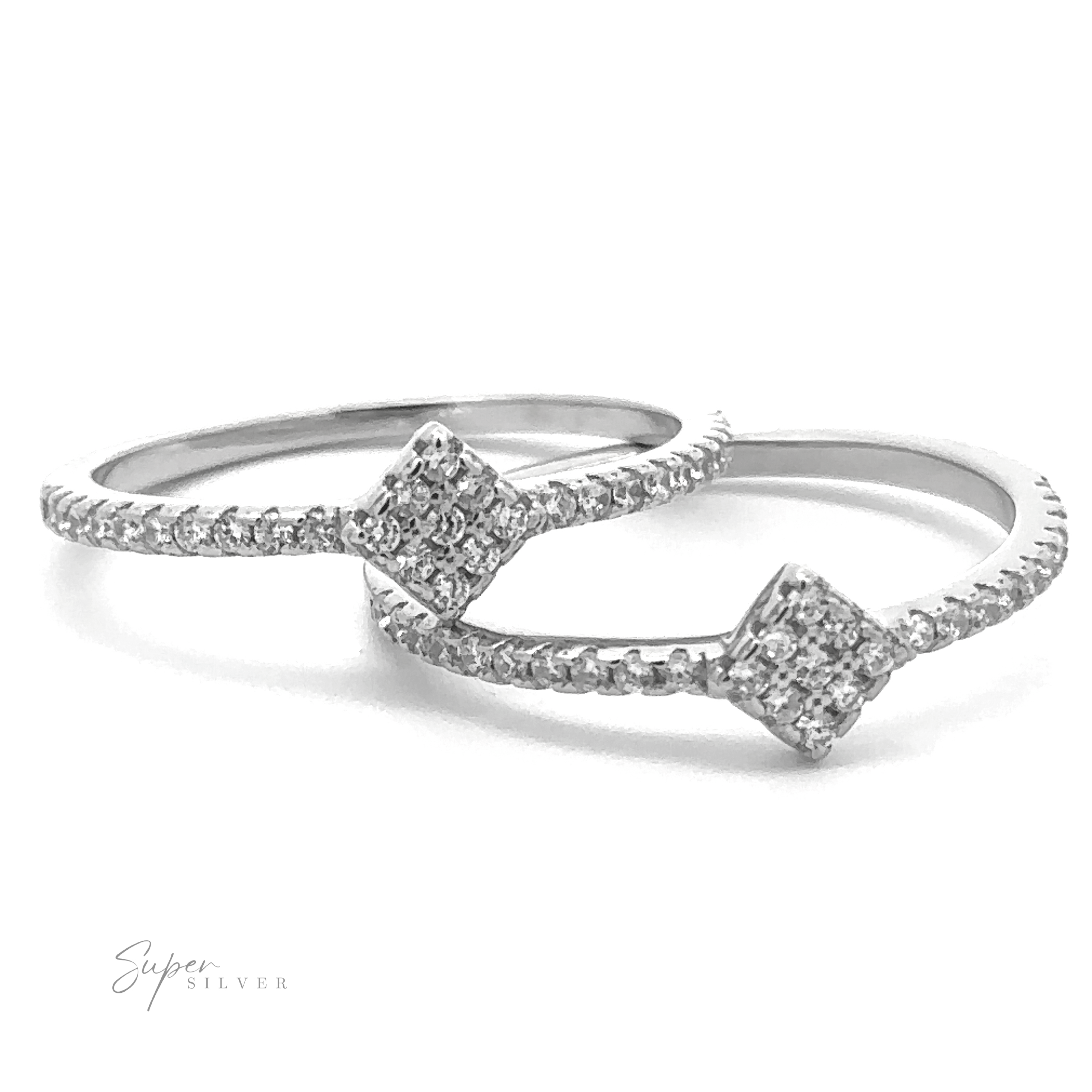 Two silver engagement rings with square diamond clusters and small round diamonds embedded in the delicate bands, positioned side by side on a white background. Highlighting the elegance of Tiny Pave Cubic Zirconia Diamond-Shaped Ring, this set embodies minimalist design. Text reads "Super Silver.