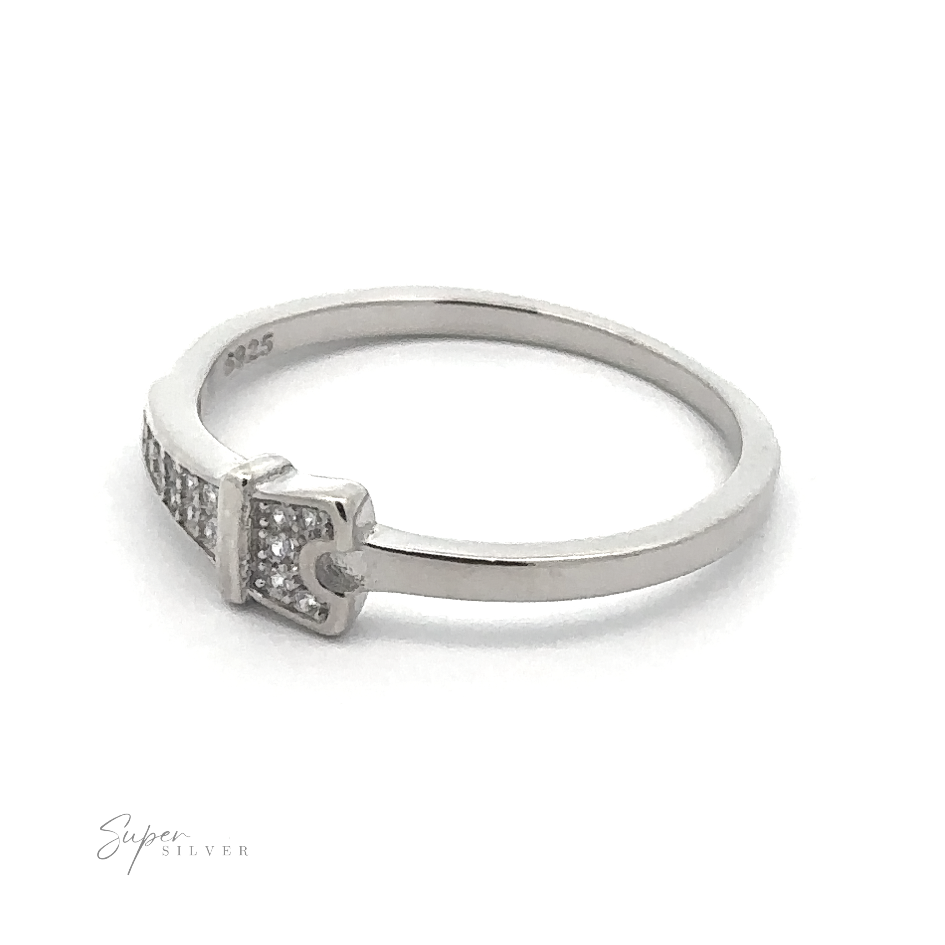 The Pave Cubic Zirconia Eiffel Tower Ring is a stunning silver piece with a rectangular design adorned with small, embedded stones on one side, radiating Parisian elegance. Engraved with "925" and branded "Super Silver," this ring encapsulates a timeless charm.