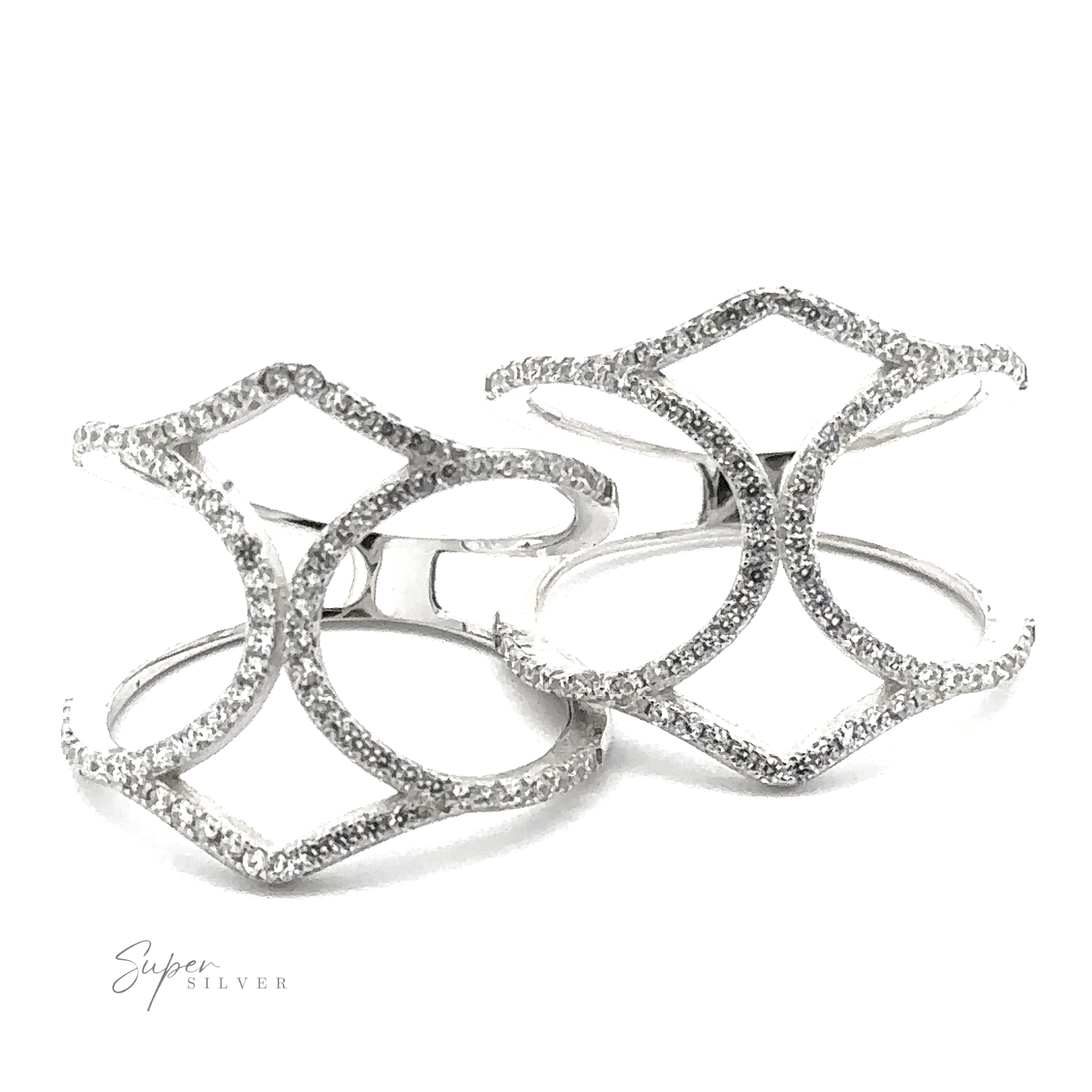 Pavé Ring with Large Open Band with intricate, geometric designs encrusted with small diamonds. "Super Silver" is visibly branded on the lower left corner.