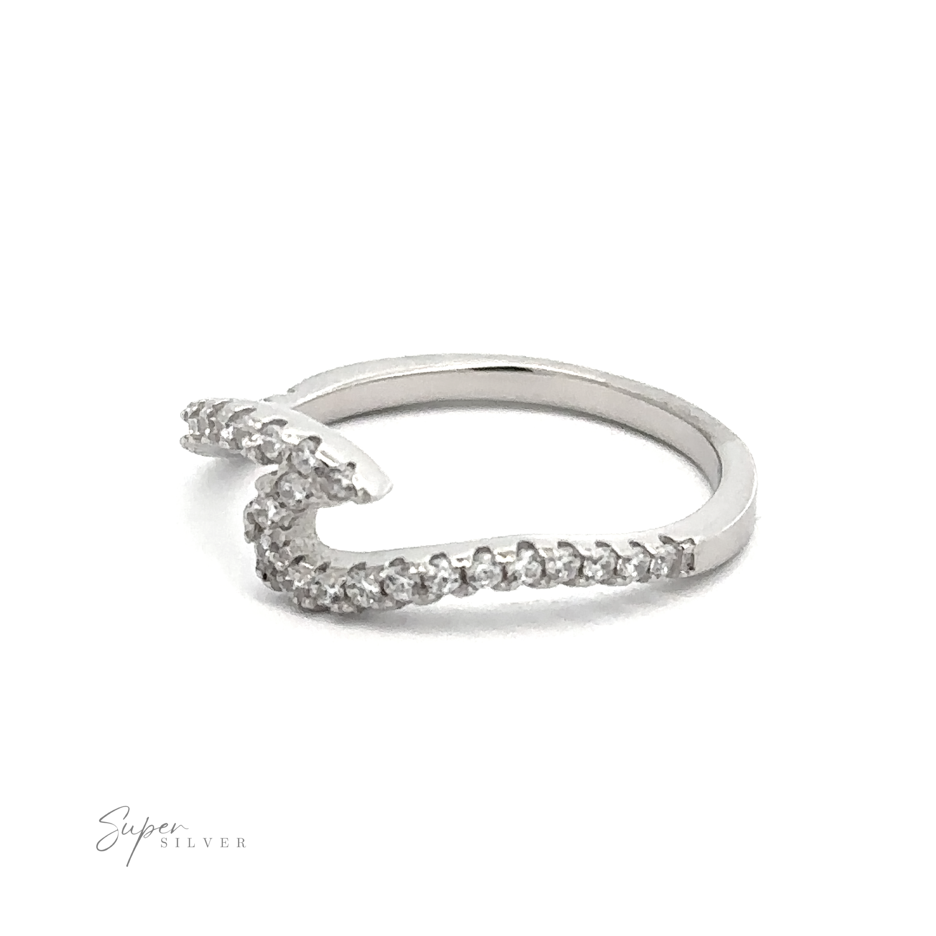 A sterling silver ring with a unique wavy design, adorned with small cubic zirconia gemstones. The Pave Wave Ring is placed against a plain white background. "Super Silver" is written in cursive at the bottom left corner.